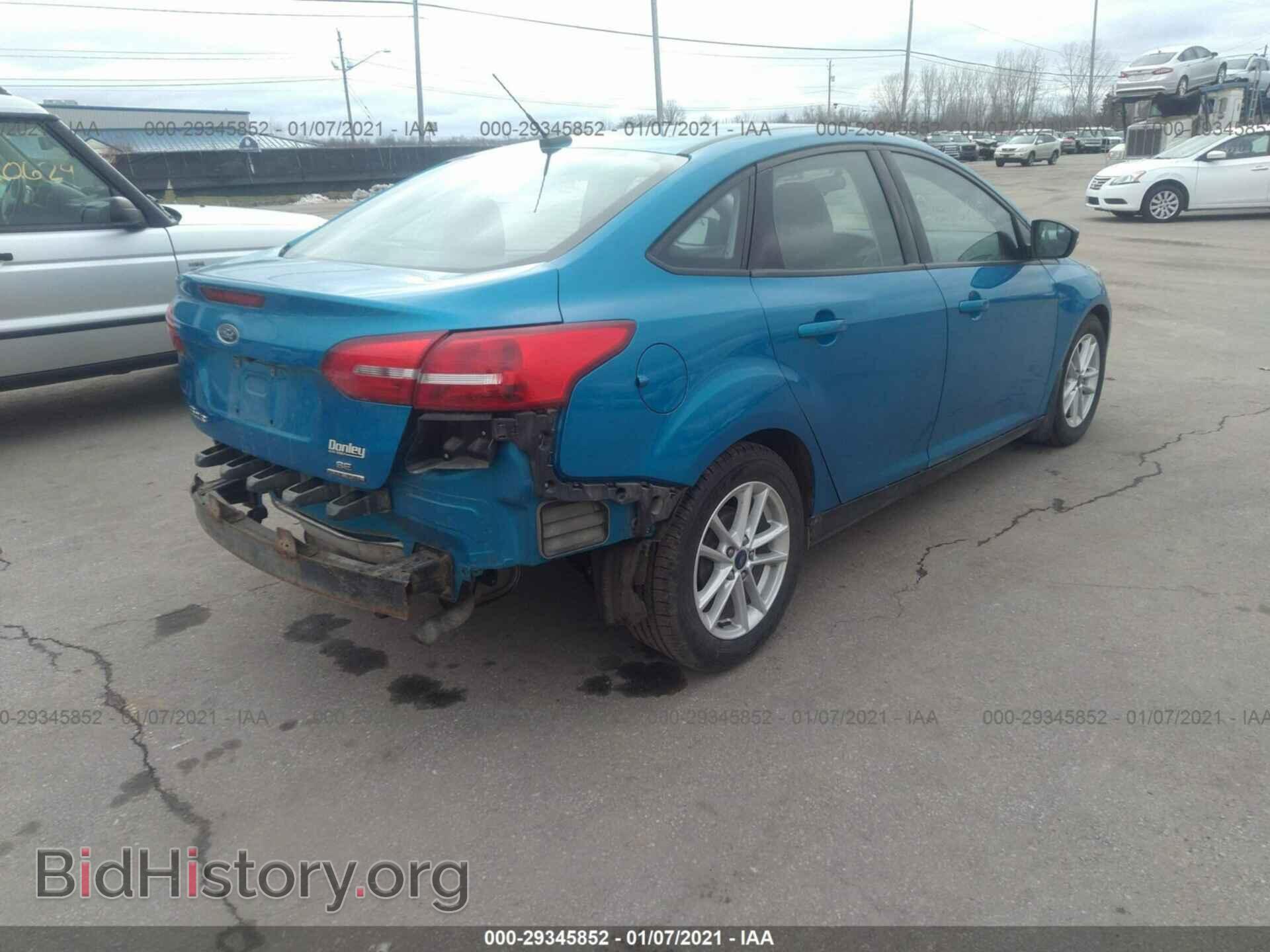 2016 FORD FOCUS - VIN: 1FADP3F21GL358293 - Photo 4