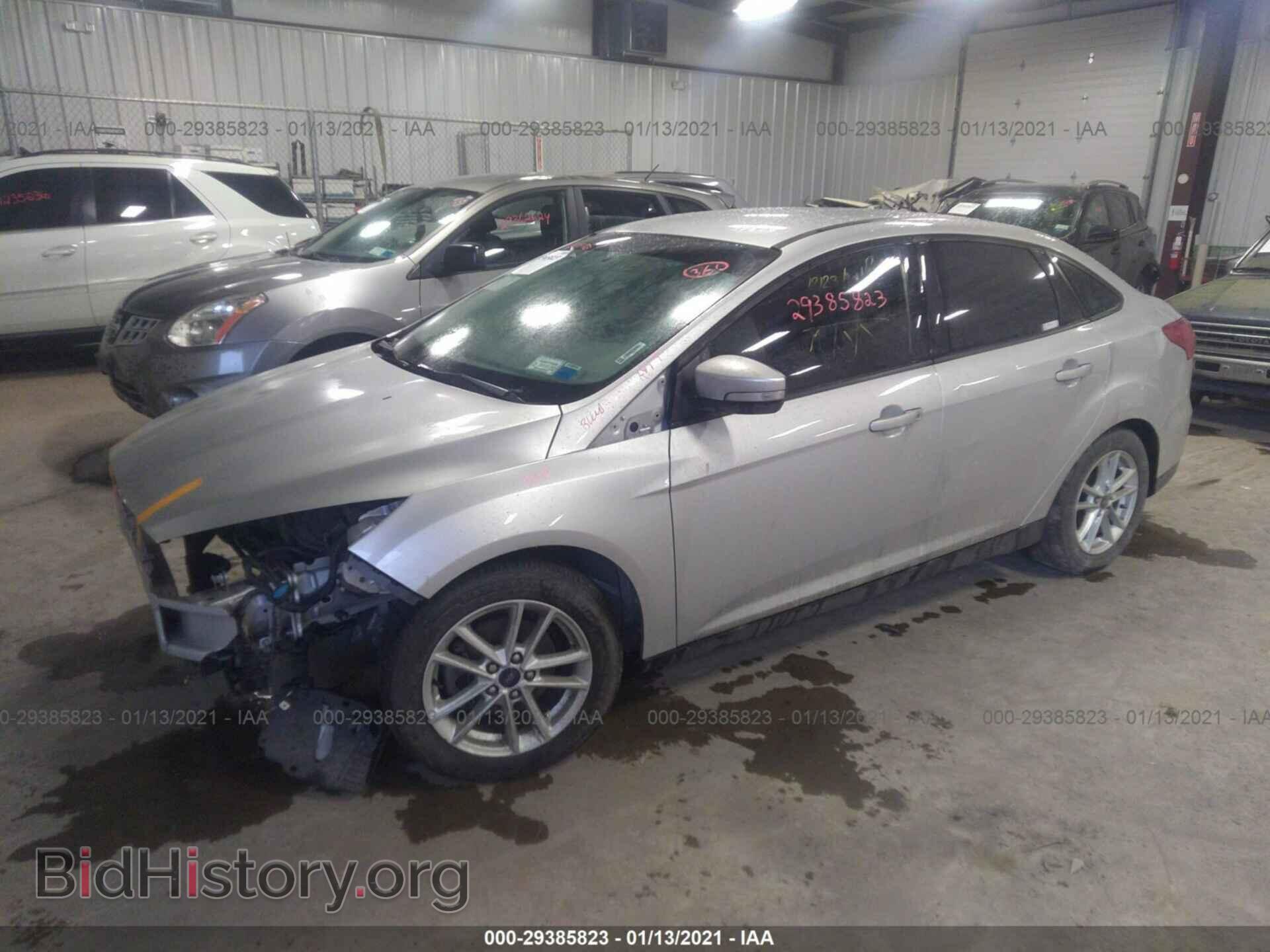2016 FORD FOCUS - VIN: 1FADP3F22GL386894 - Photo 2