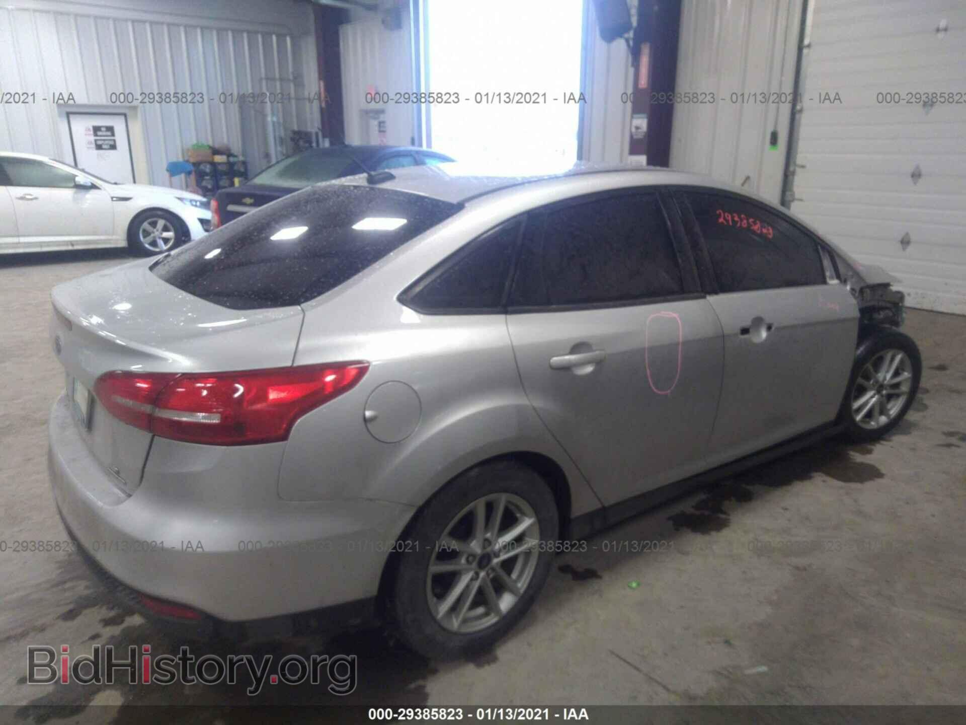 2016 FORD FOCUS - VIN: 1FADP3F22GL386894 - Photo 4