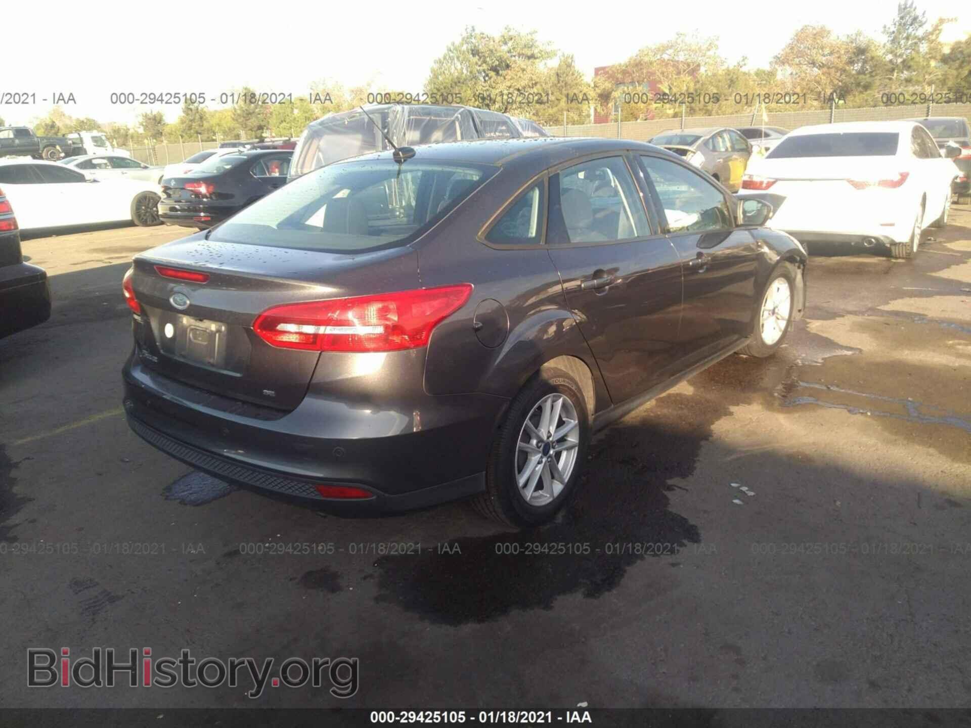 2015 FORD FOCUS - VIN: 1FADP3F25FL324792 - Photo 4