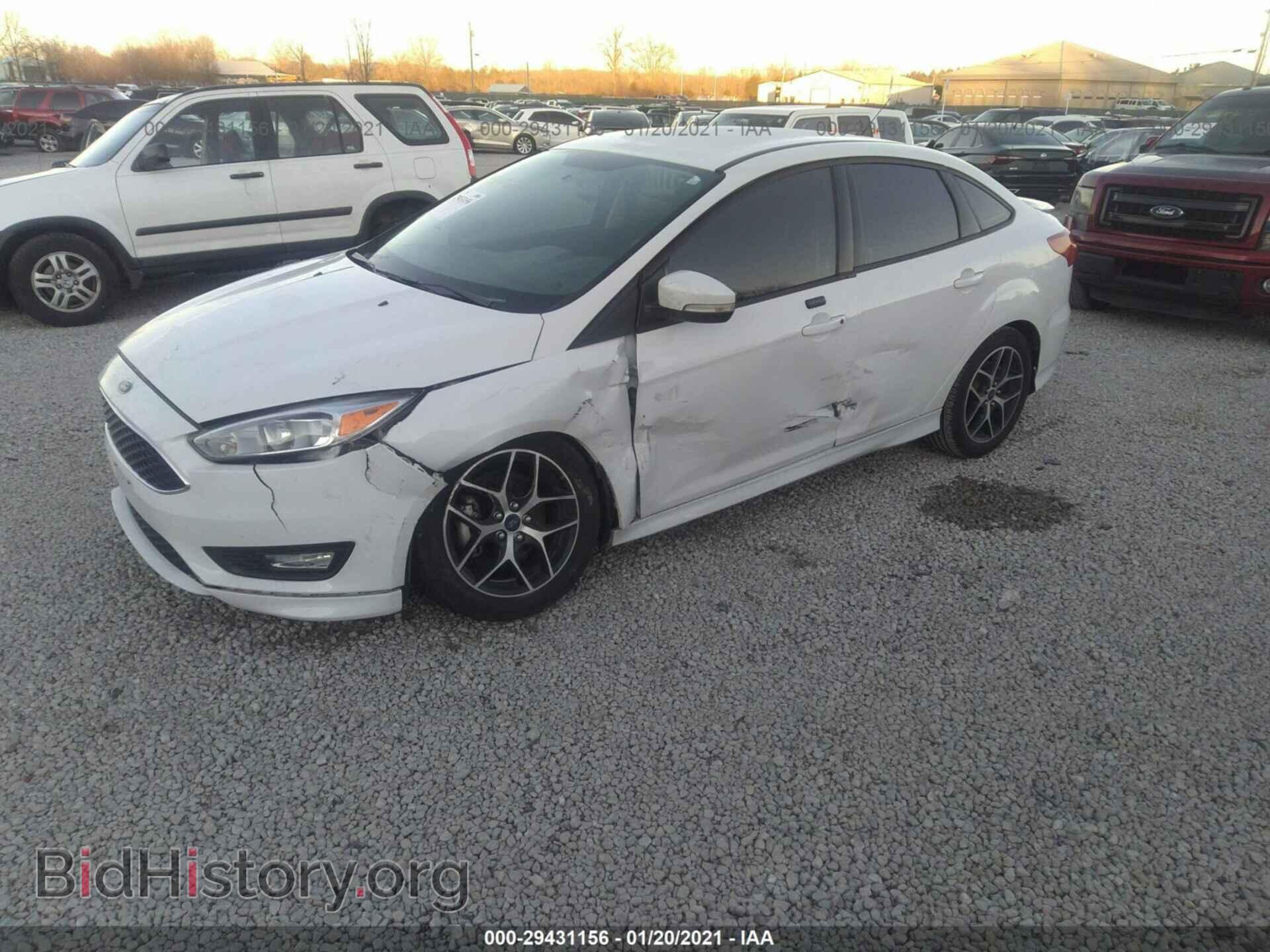 2016 FORD FOCUS - VIN: 1FADP3F2XGL268494 - Фото 2