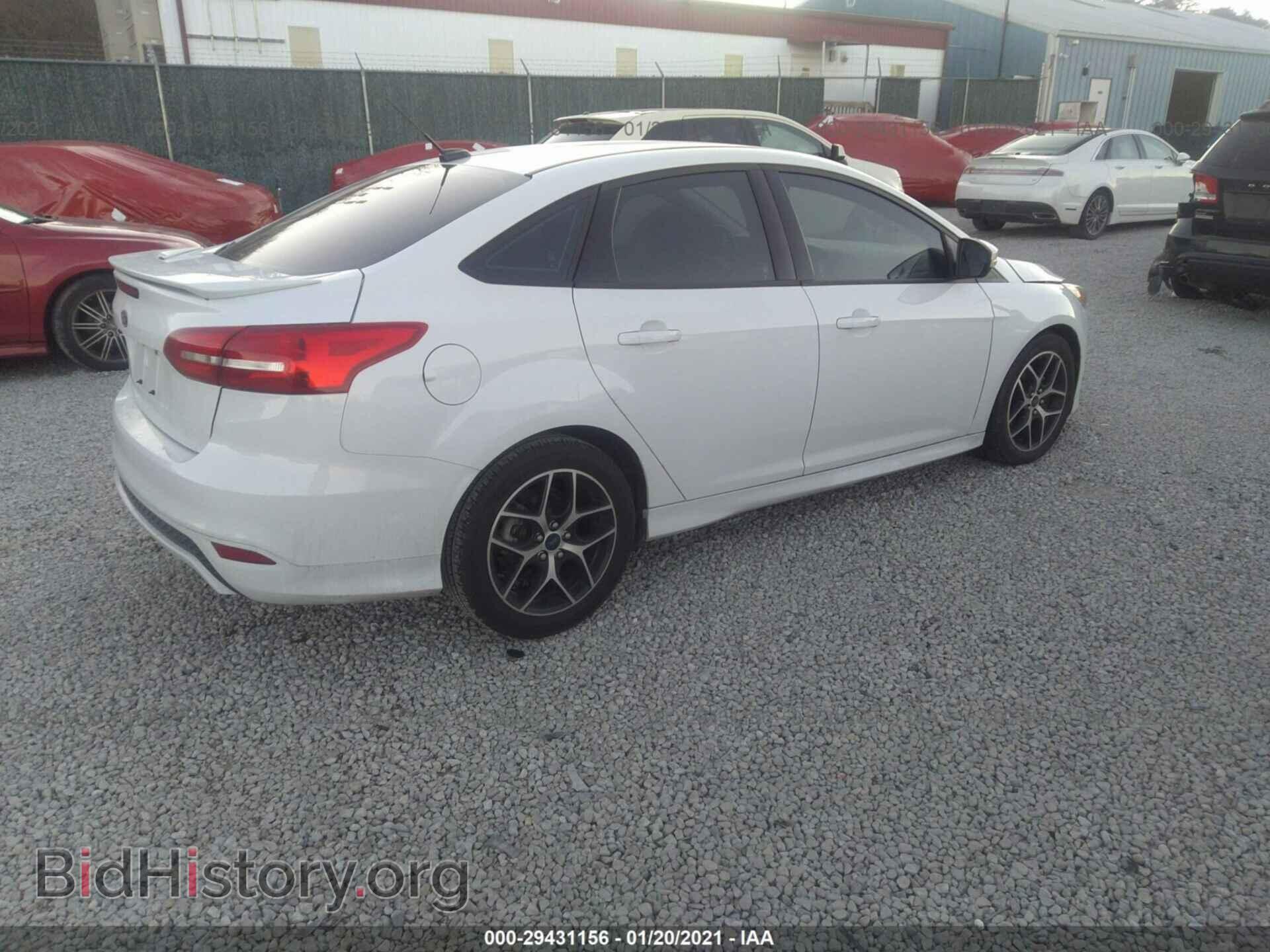 2016 FORD FOCUS - VIN: 1FADP3F2XGL268494 - Фото 4