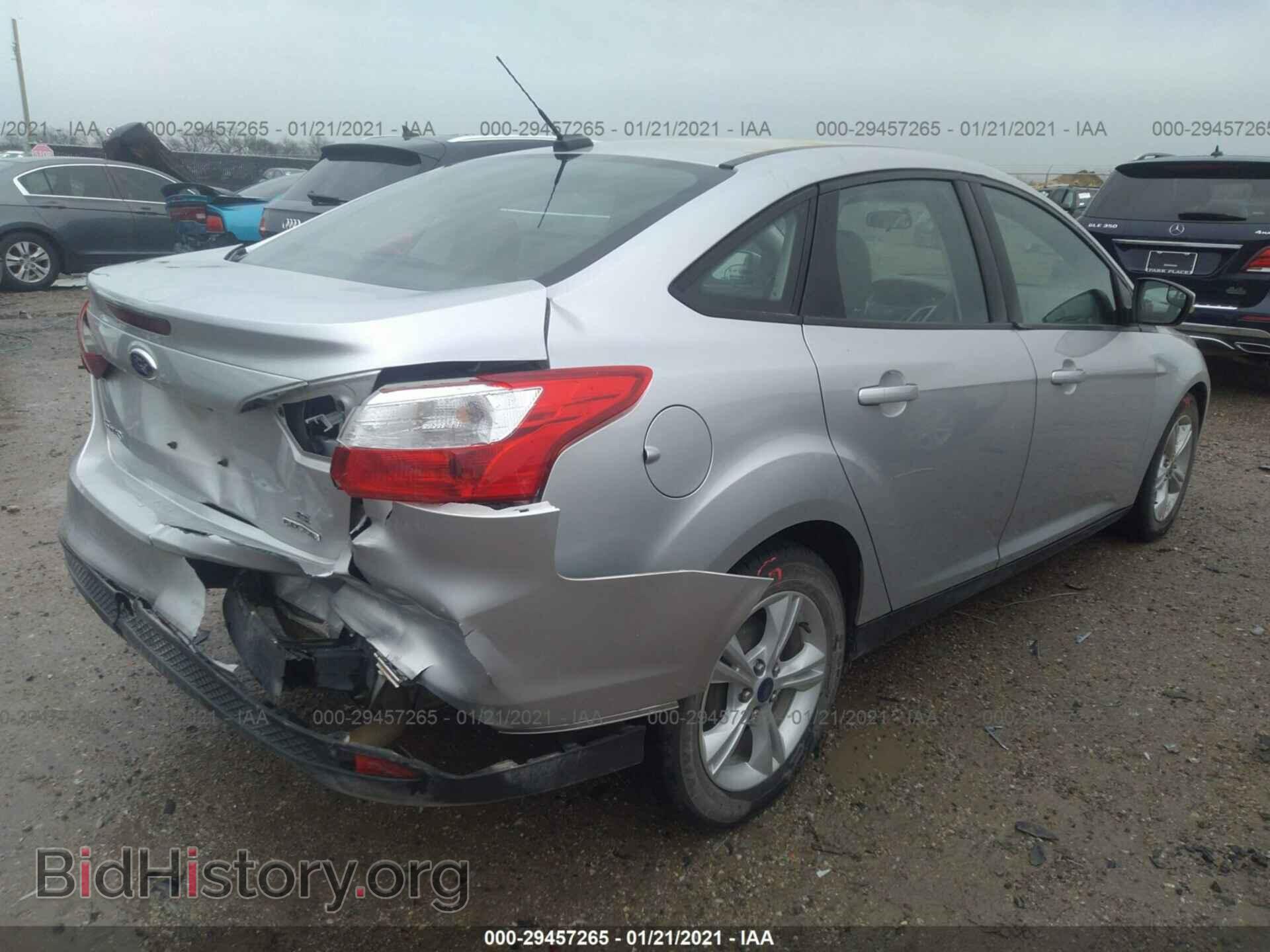 2014 FORD FOCUS - VIN: 1FADP3F24EL413400 - Photo 4