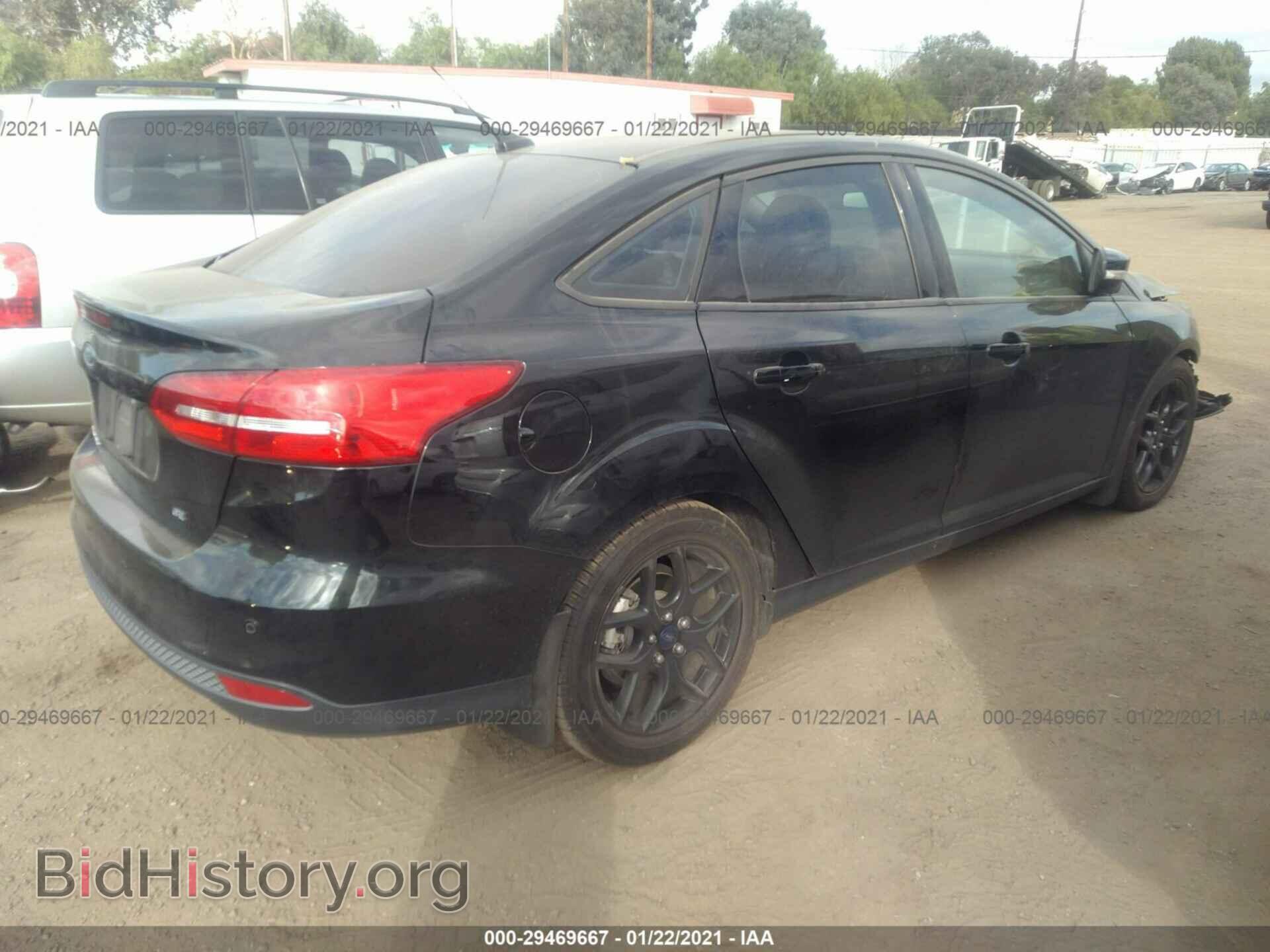 2016 FORD FOCUS - VIN: 1FADP3F24GL203284 - Photo 4