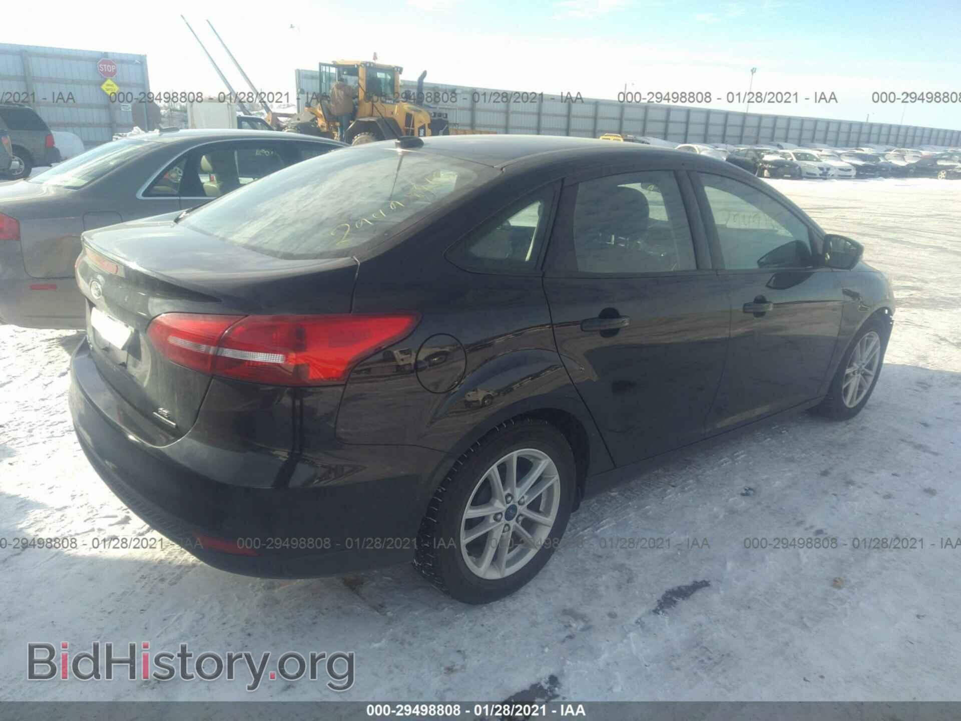 2016 FORD FOCUS - VIN: 1FADP3F2XGL216962 - Photo 4