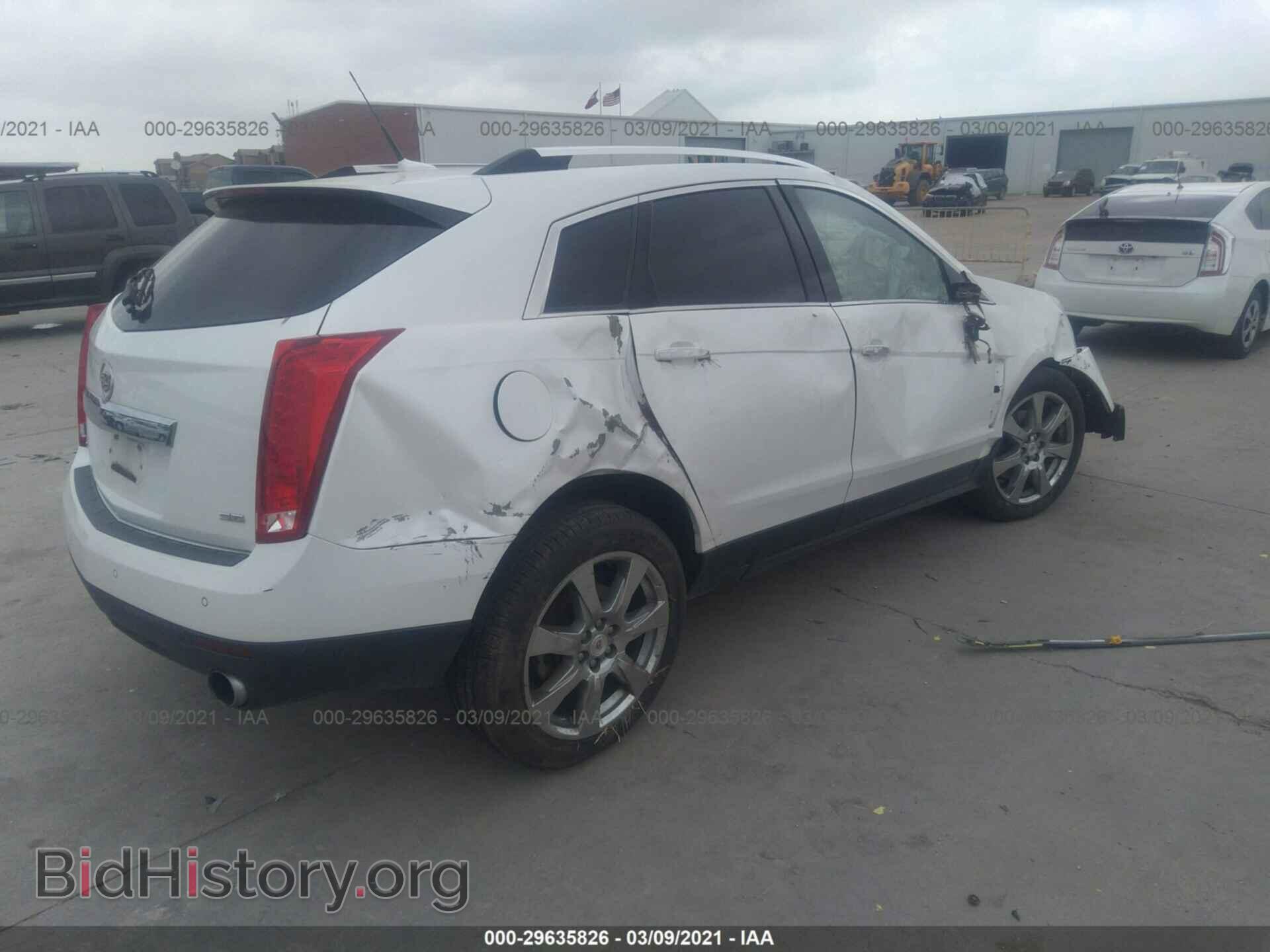 2012 CADILLAC SRX - VIN: 3GYFNBE39CS557541 - Фото 4