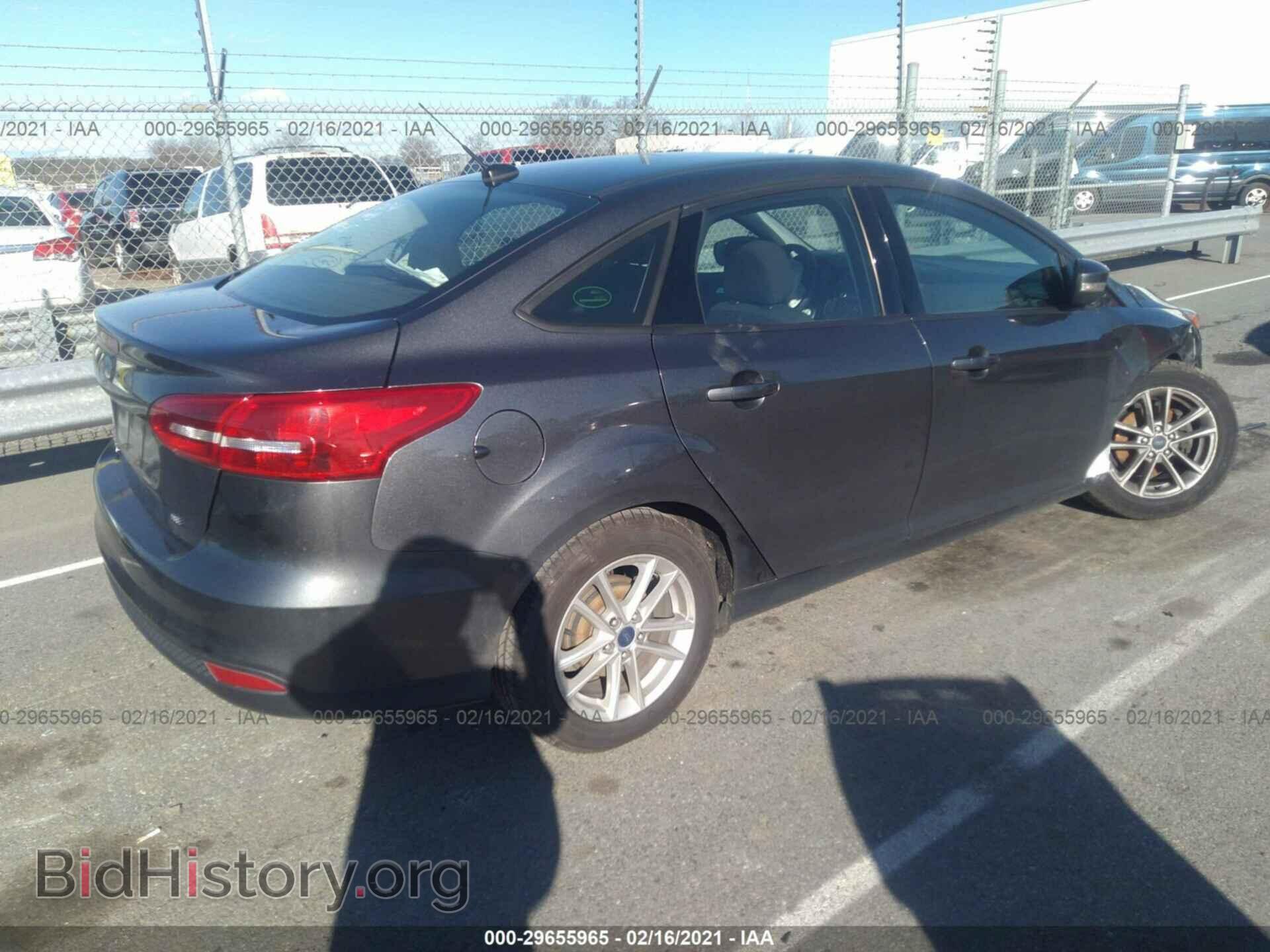 2016 FORD FOCUS - VIN: 1FADP3F22GL372994 - Photo 4