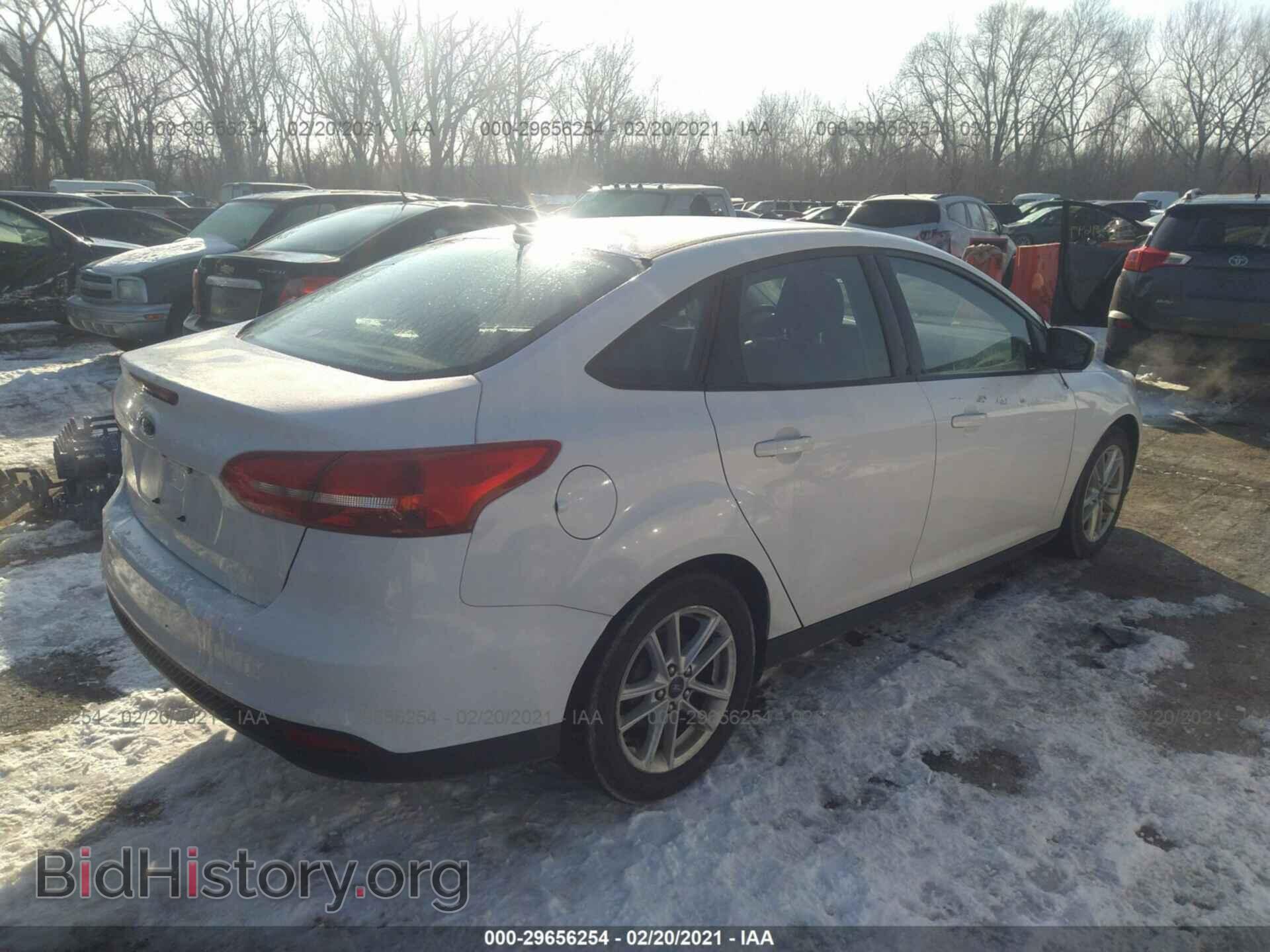 2017 FORD FOCUS - VIN: 1FADP3F24HL217302 - Photo 4