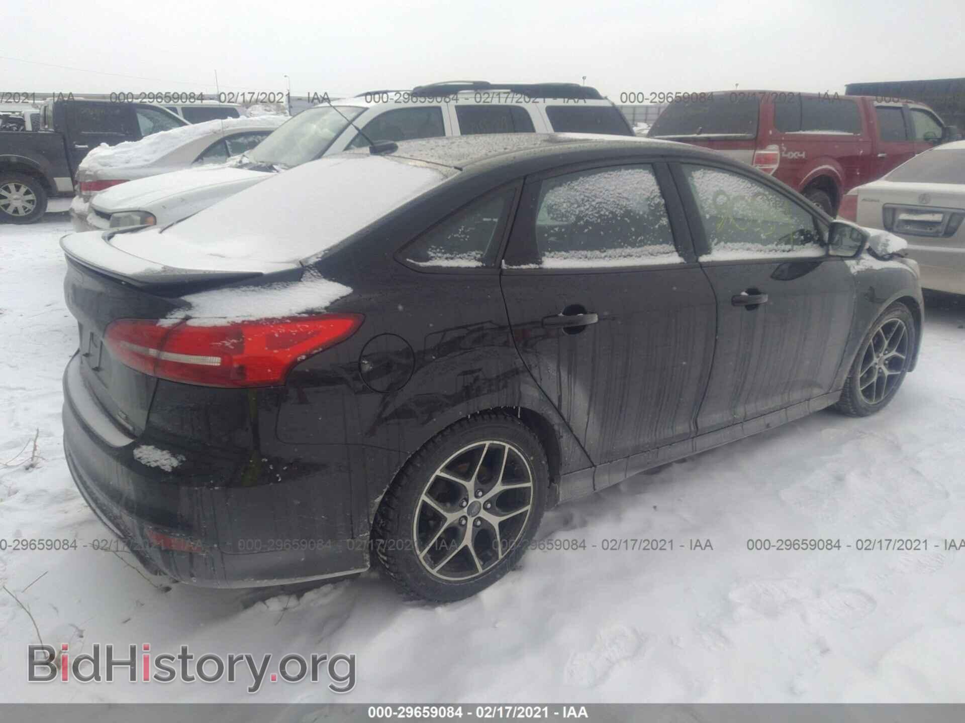 2015 FORD FOCUS - VIN: 1FADP3F21FL281195 - Photo 4