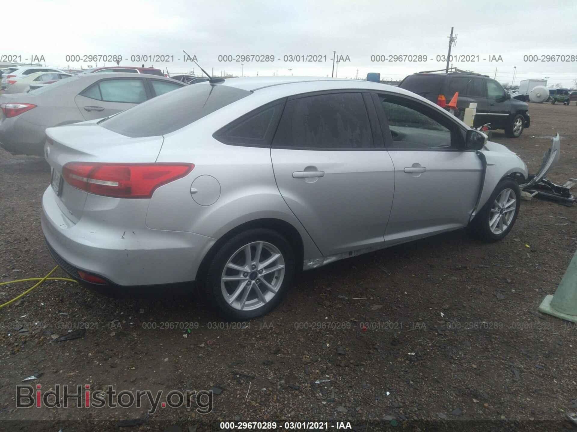 2017 FORD FOCUS - VIN: 1FADP3F21HL313677 - Photo 4