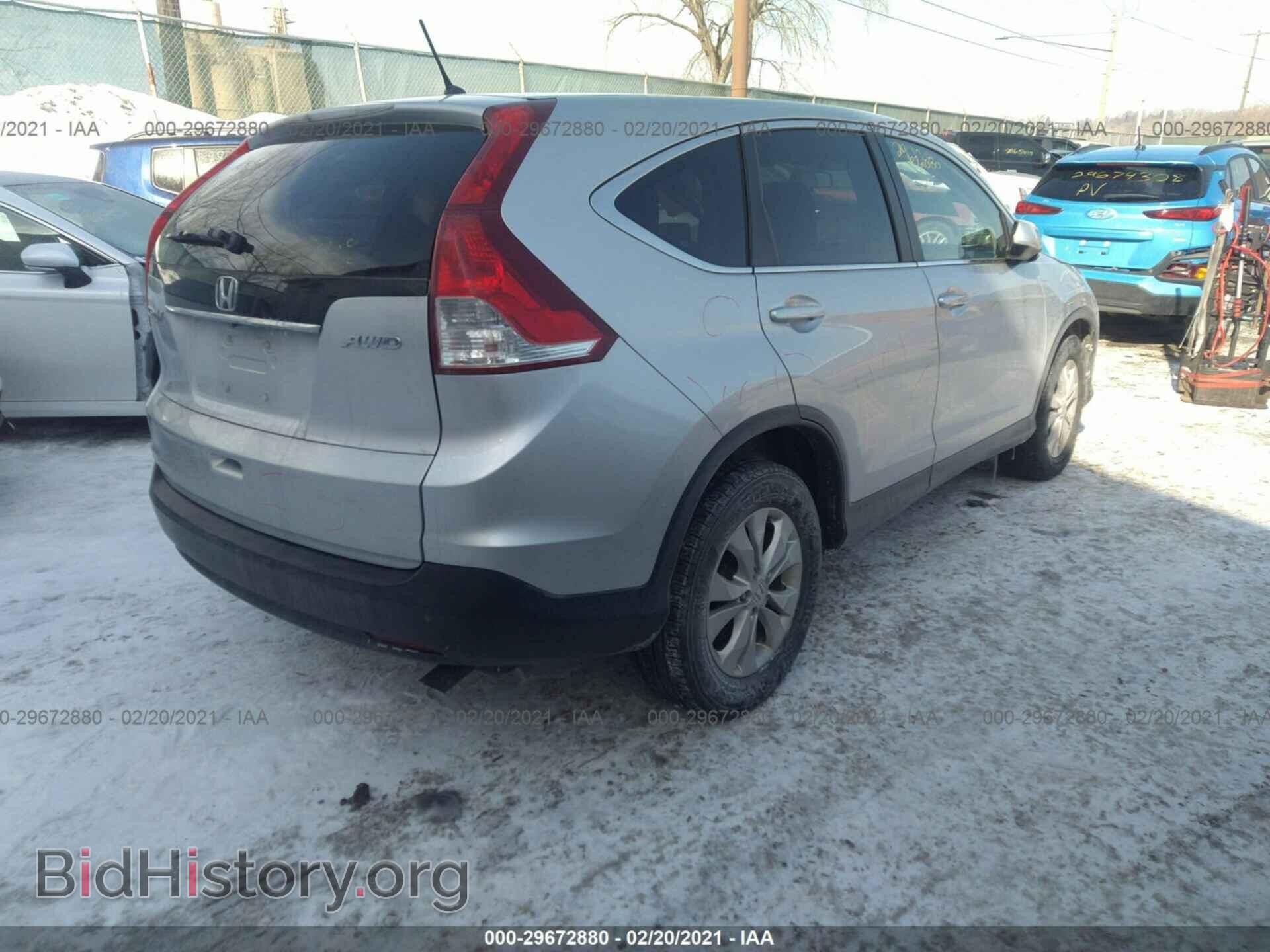 2014 HONDA CR-V - VIN: 2HKRM4H59EH640933 - Фото 4