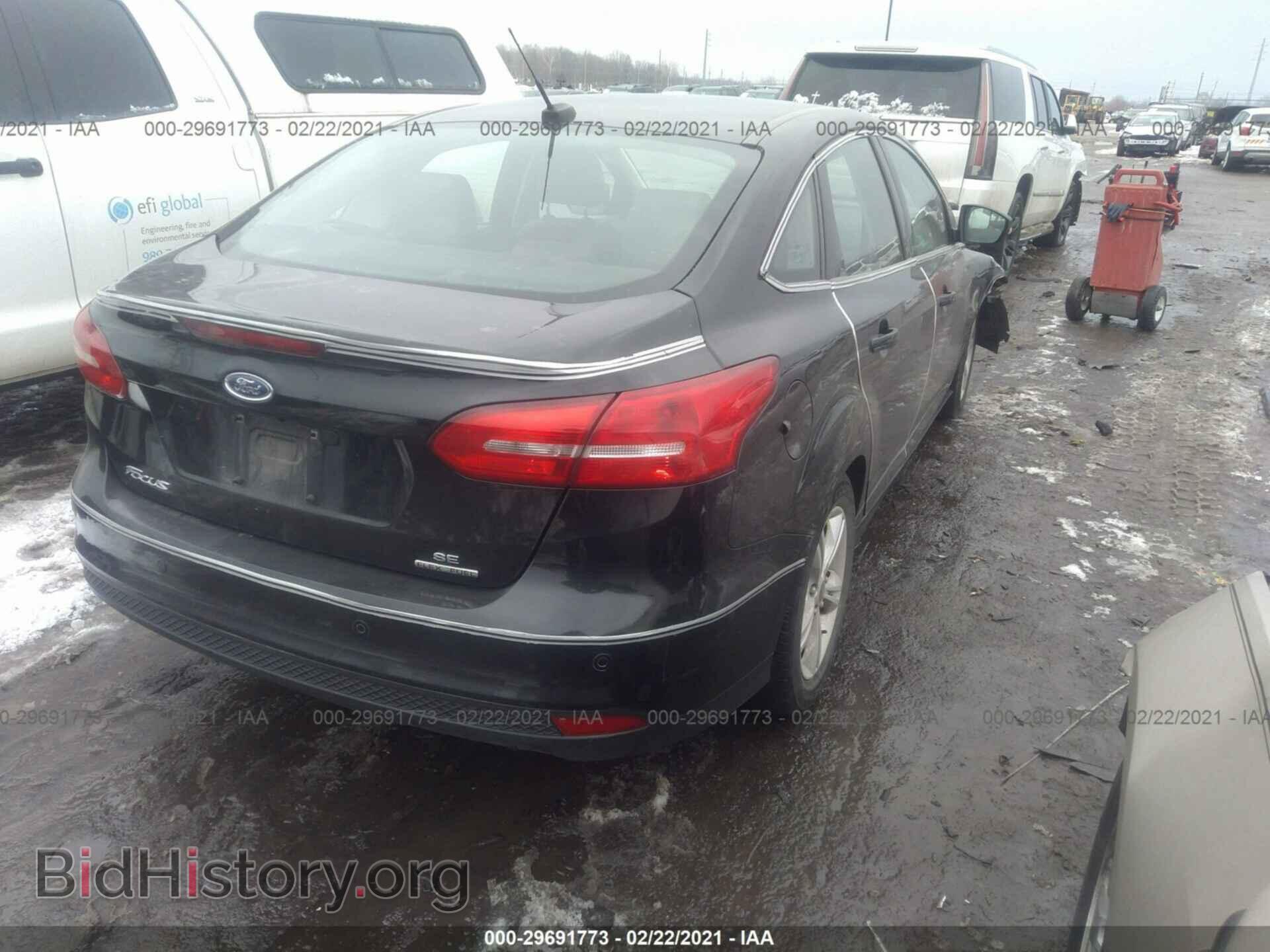 2016 FORD FOCUS - VIN: 1FADP3F26GL224864 - Photo 4