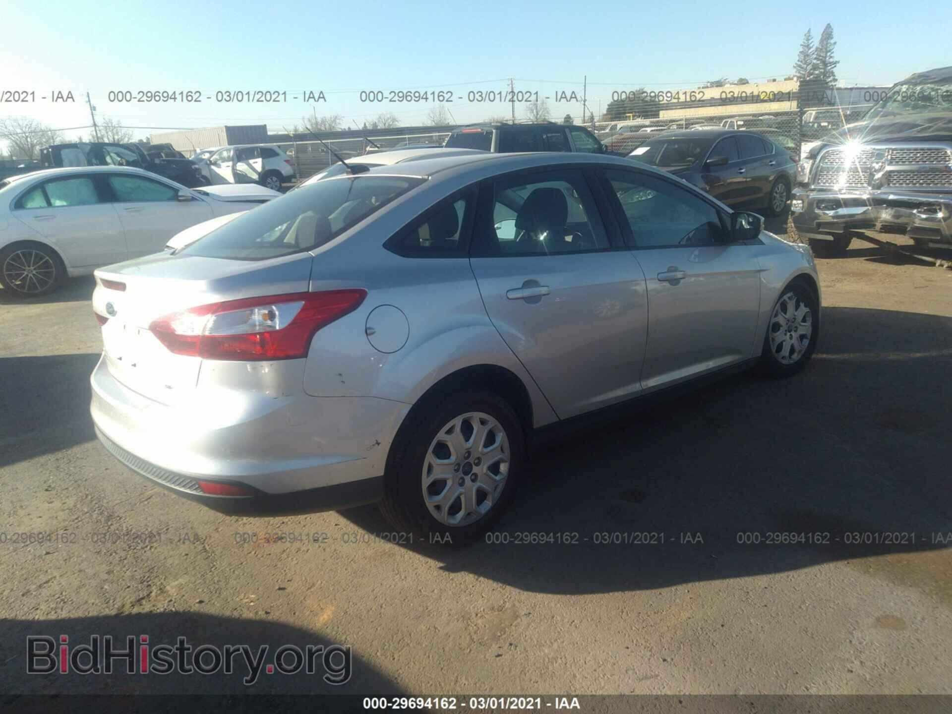 2014 FORD FOCUS - VIN: 1FADP3F24EL260064 - Photo 4