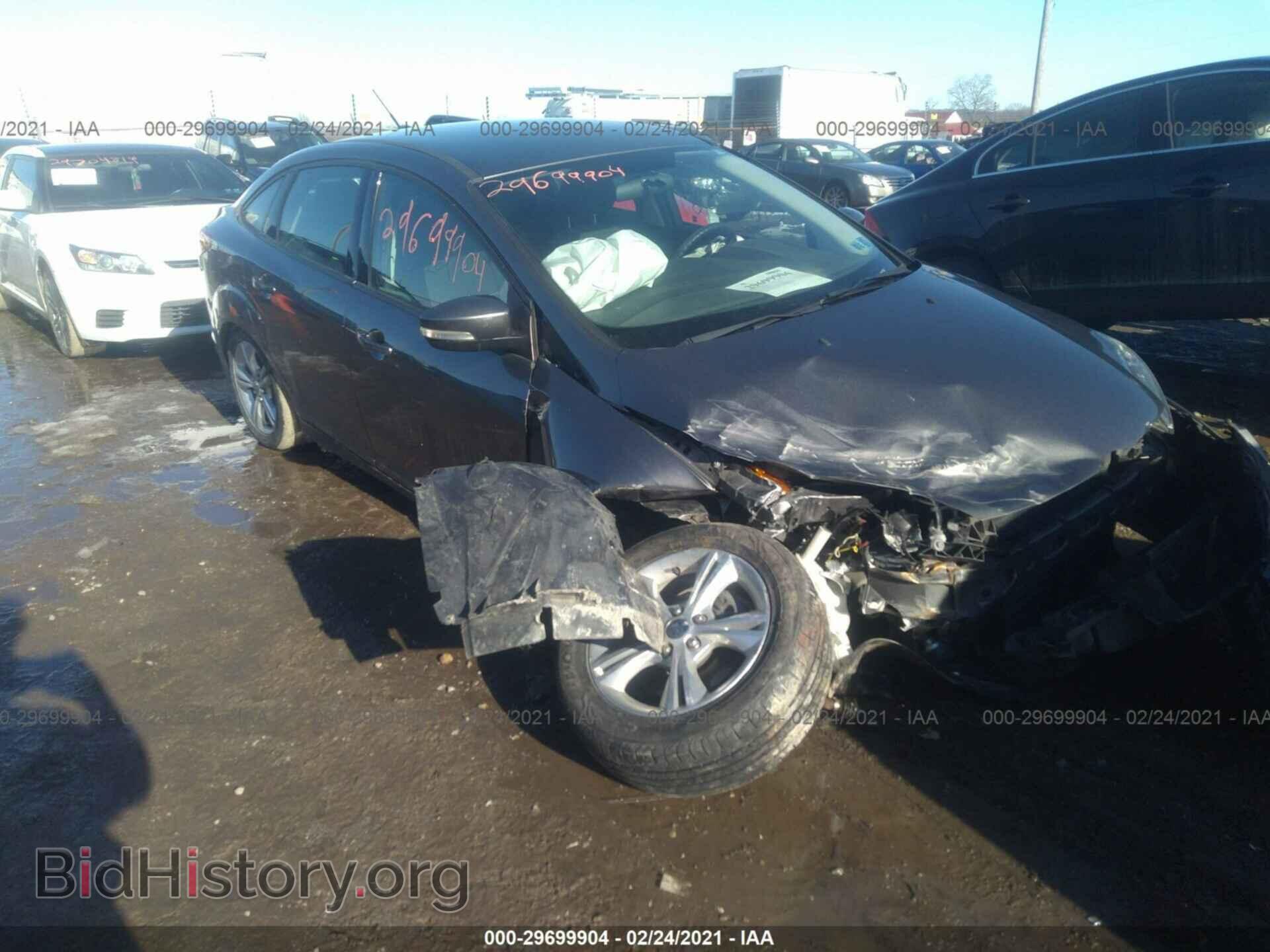 Фотография 1FADP3F21EL304411 - FORD FOCUS 2014