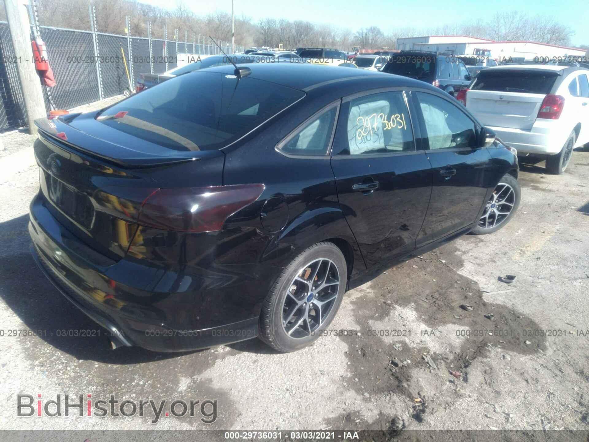 2016 FORD FOCUS - VIN: 1FADP3F22GL301407 - Photo 4