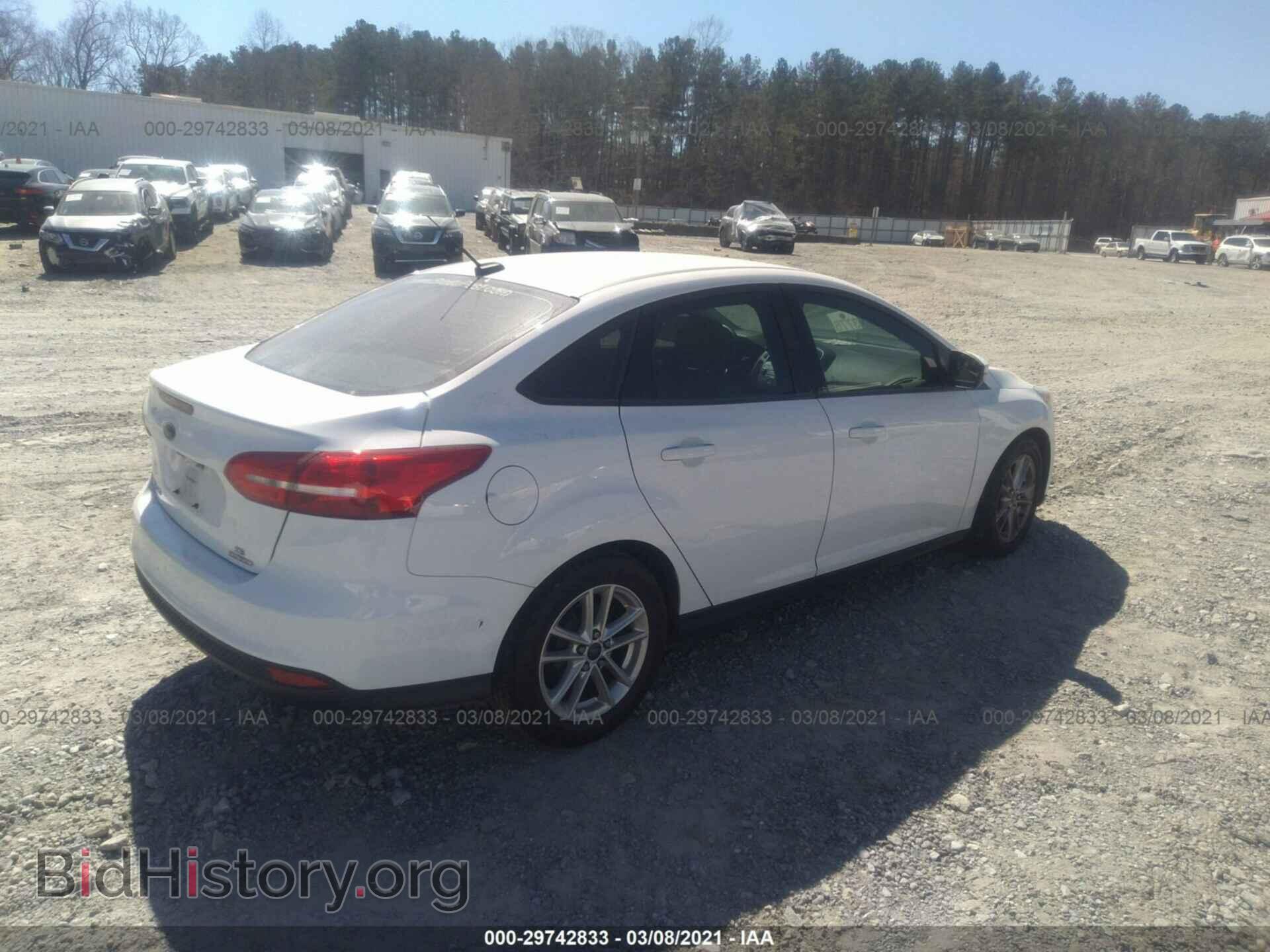 2016 FORD FOCUS - VIN: 1FADP3F22GL273866 - Photo 4