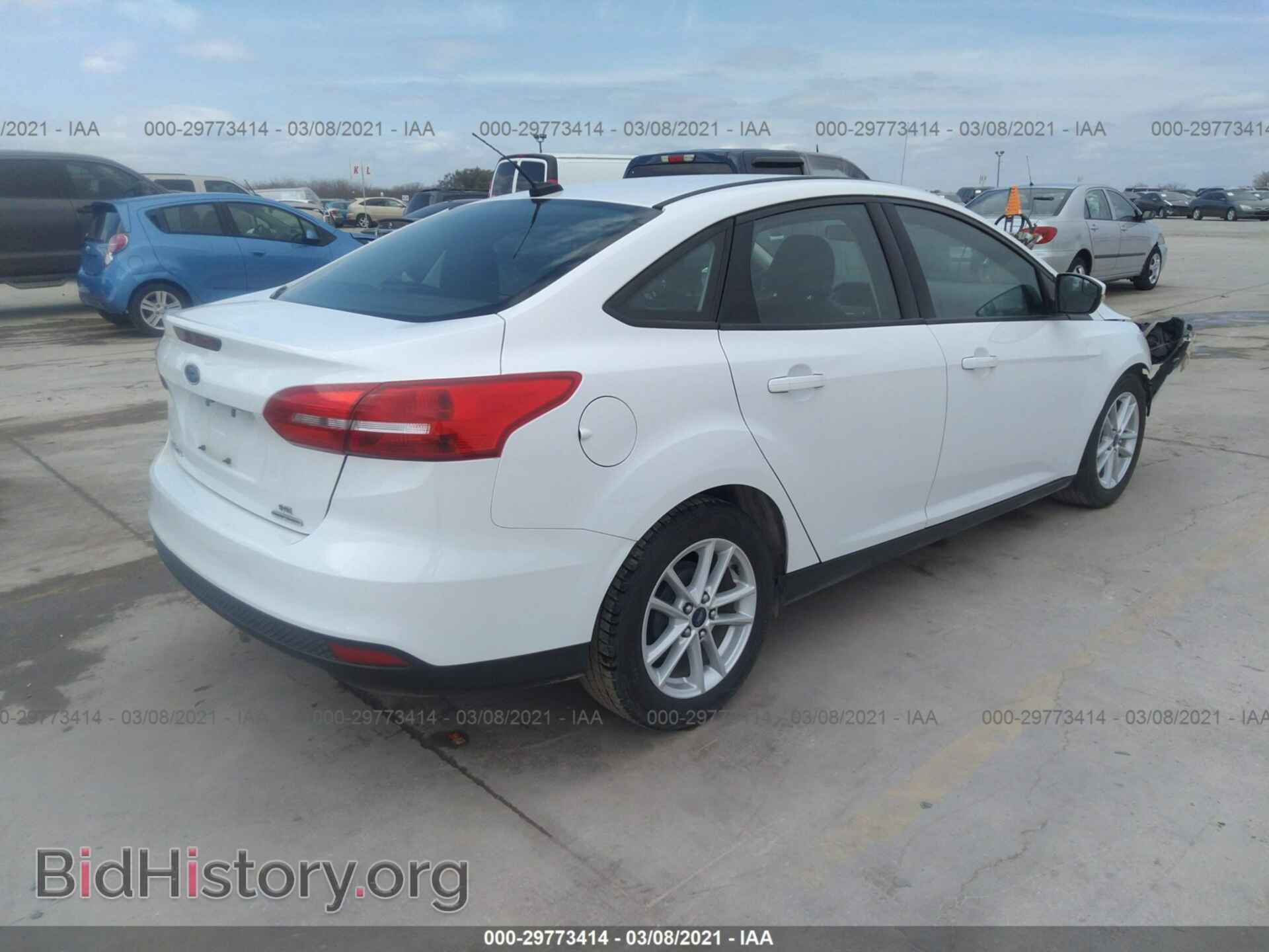 2016 FORD FOCUS - VIN: 1FADP3F22GL214168 - Photo 4
