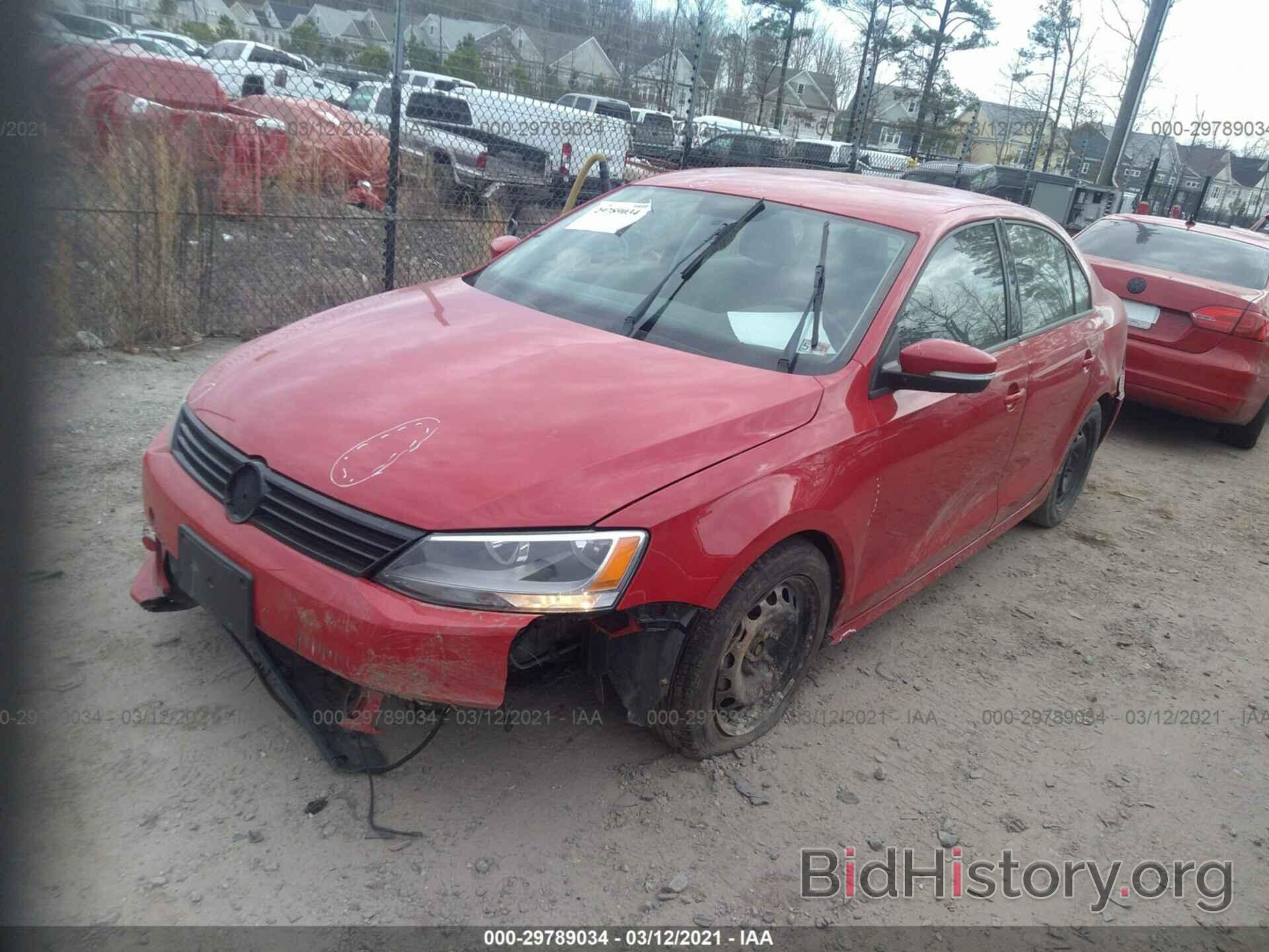 Report 3VWDX7AJ3CM064741 VOLKSWAGEN JETTA SEDAN 2012 RED