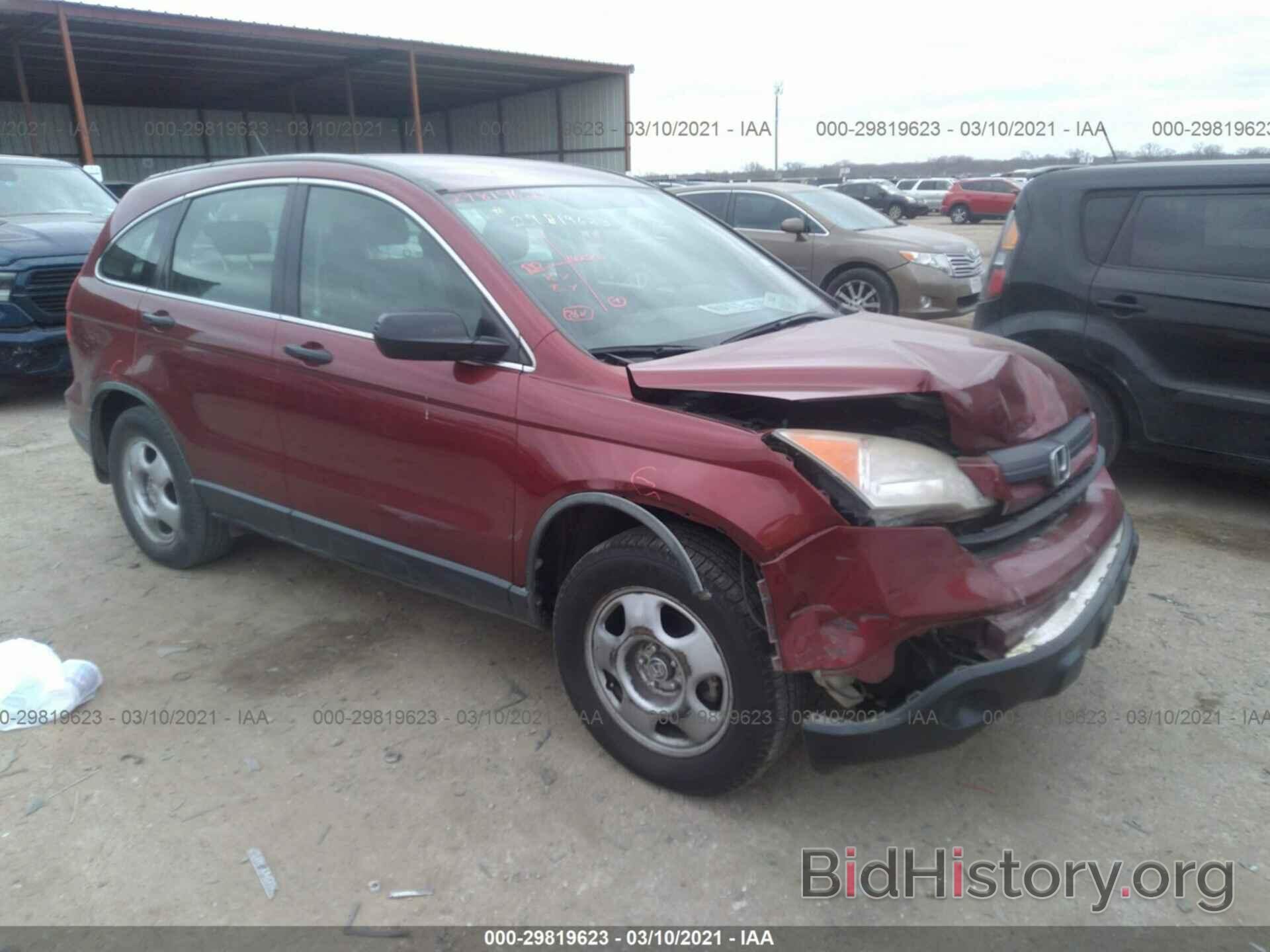 Photo JHLRE38339C015356 - HONDA CR-V 2009