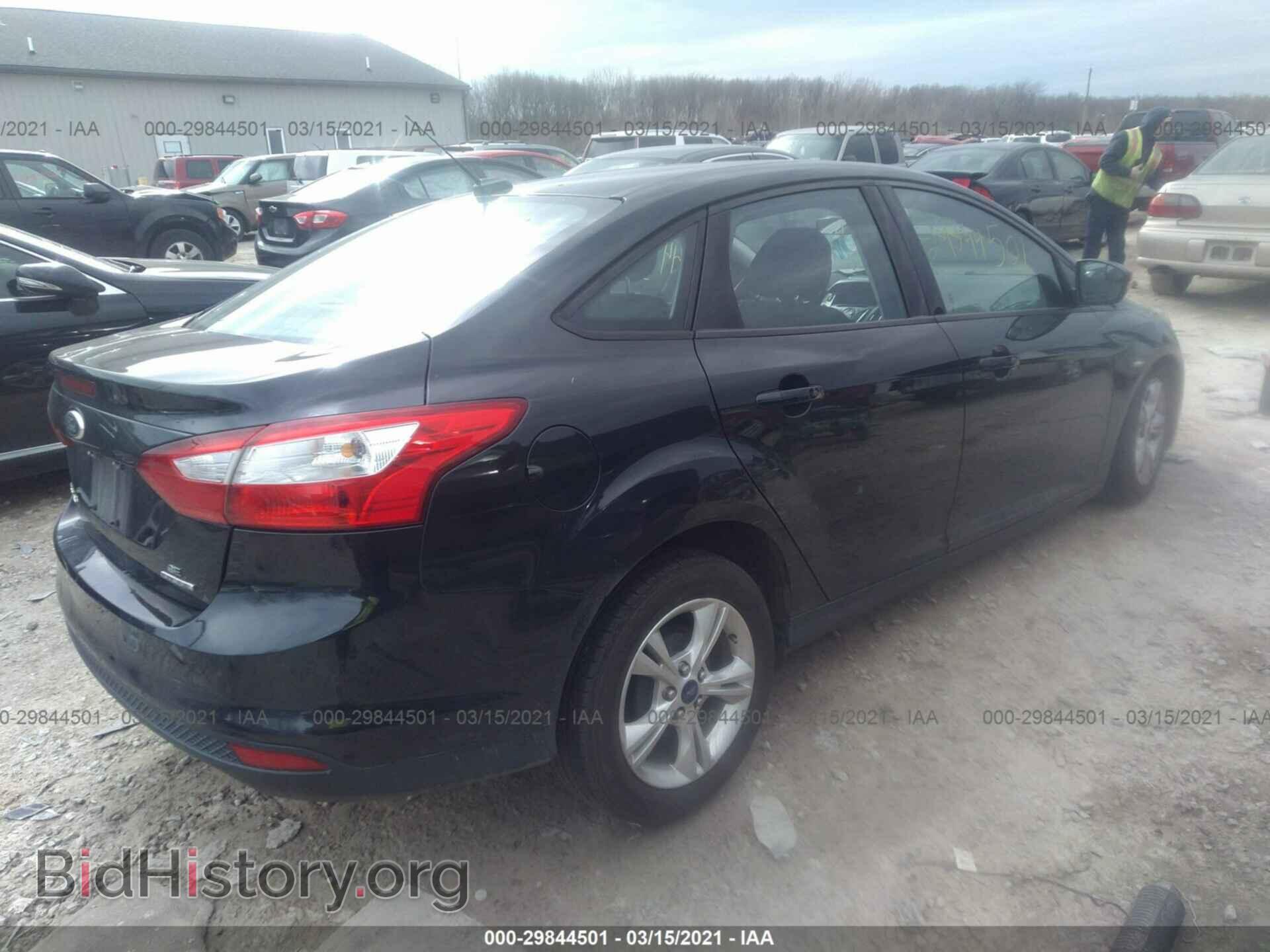 2014 FORD FOCUS - VIN: 1FADP3F28EL217525 - Photo 4