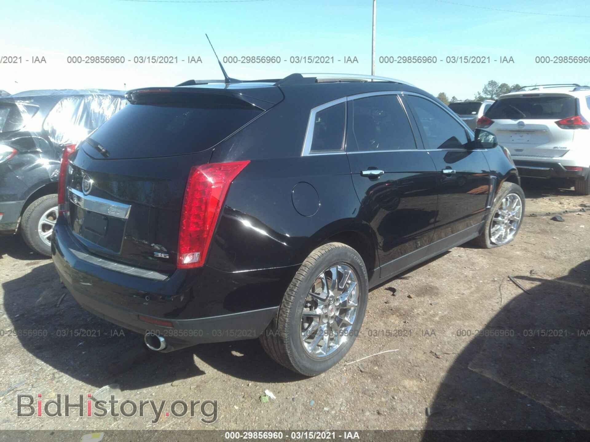 2014 CADILLAC SRX - VIN: 3GYFNDE38ES662425 - Фото 4