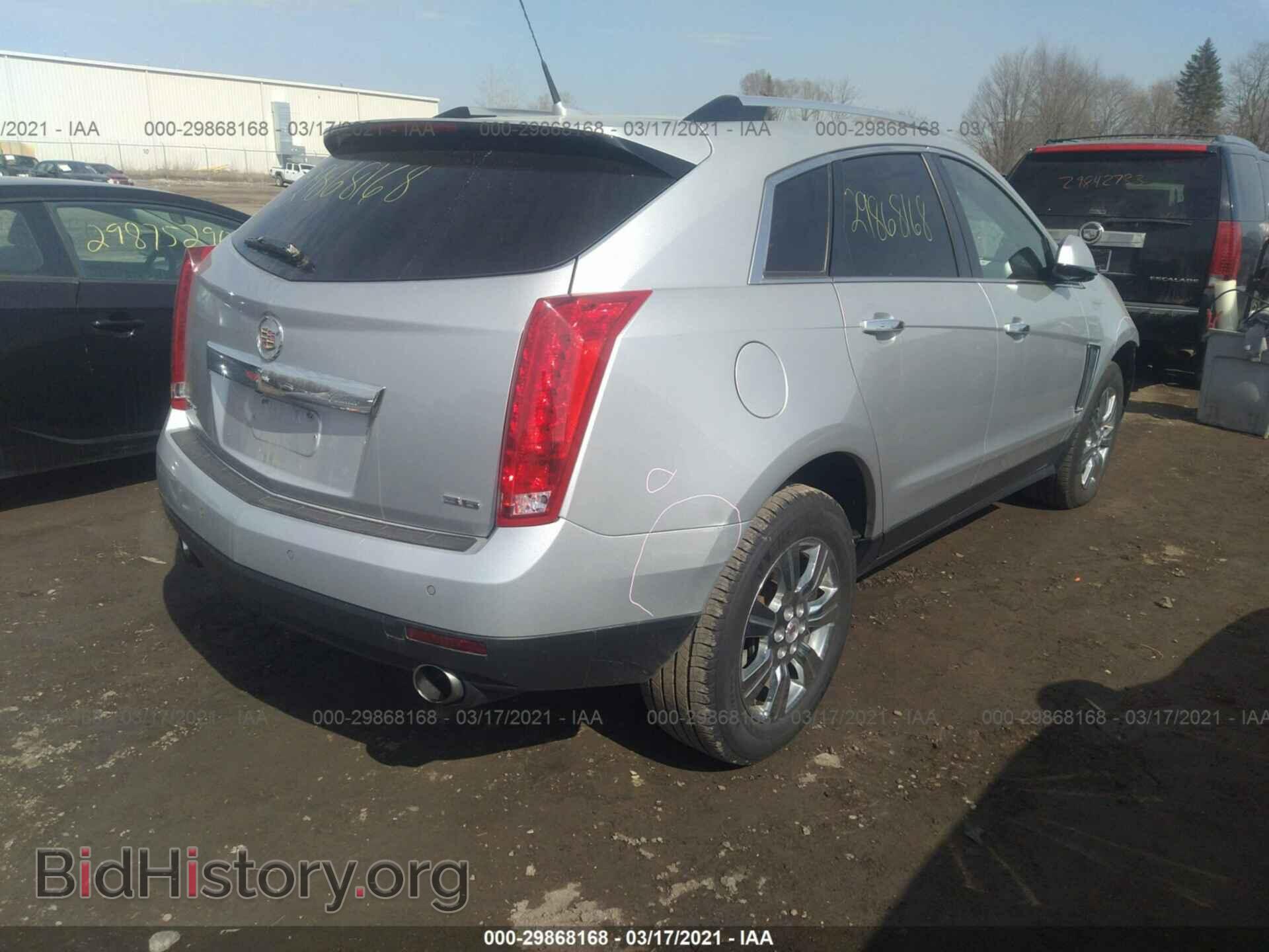 2014 CADILLAC SRX - VIN: 3GYFNBE30ES576157 - Фото 4