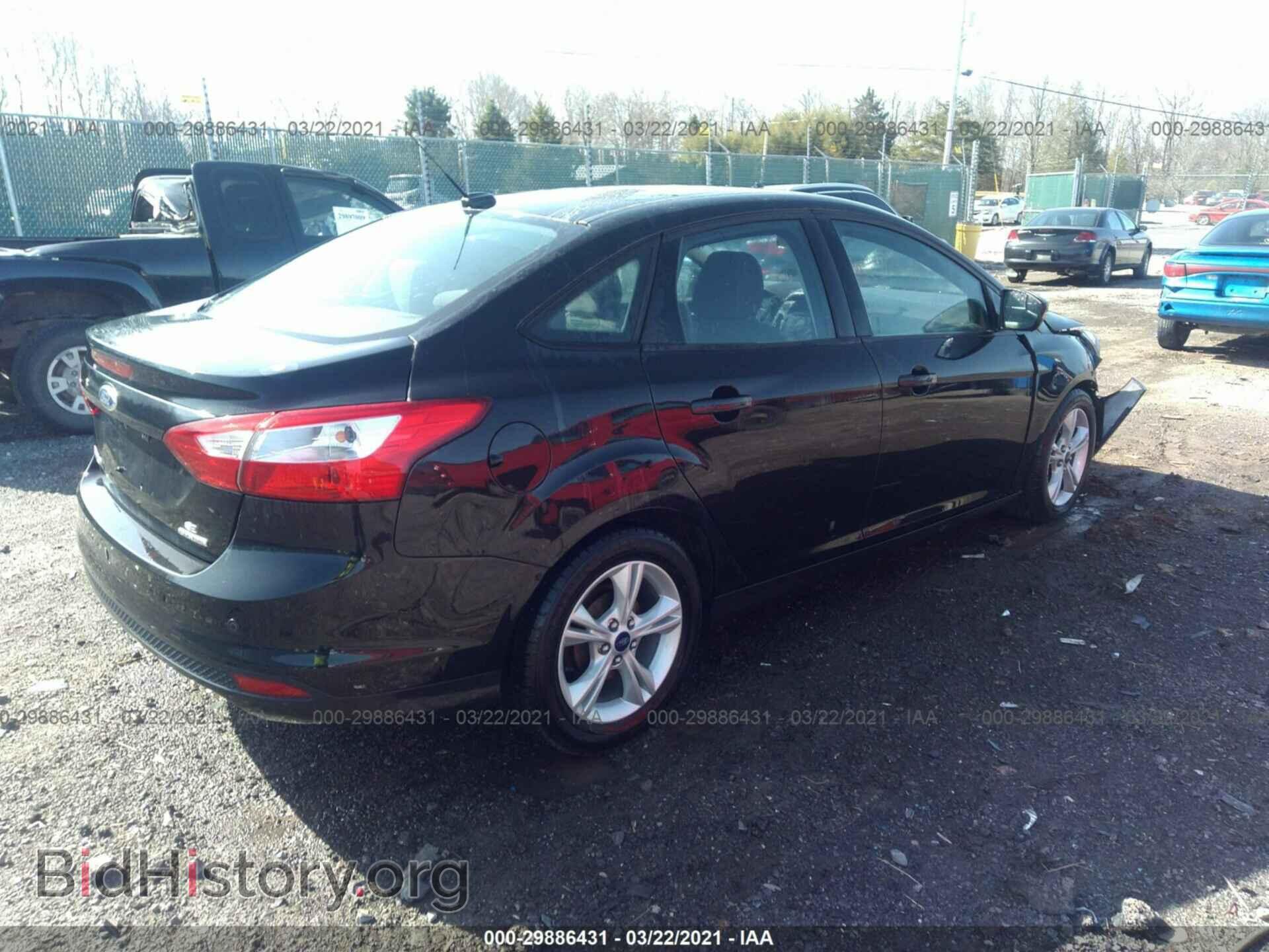 2014 FORD FOCUS - VIN: 1FADP3F28EL438767 - Photo 4