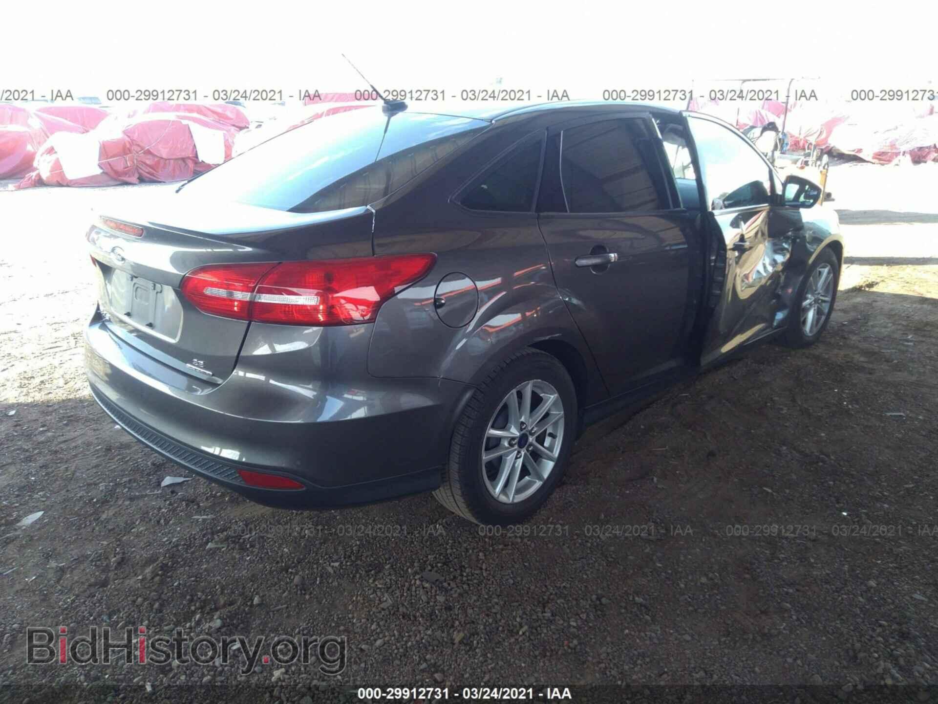 2016 FORD FOCUS - VIN: 1FADP3F25GL258570 - Photo 4