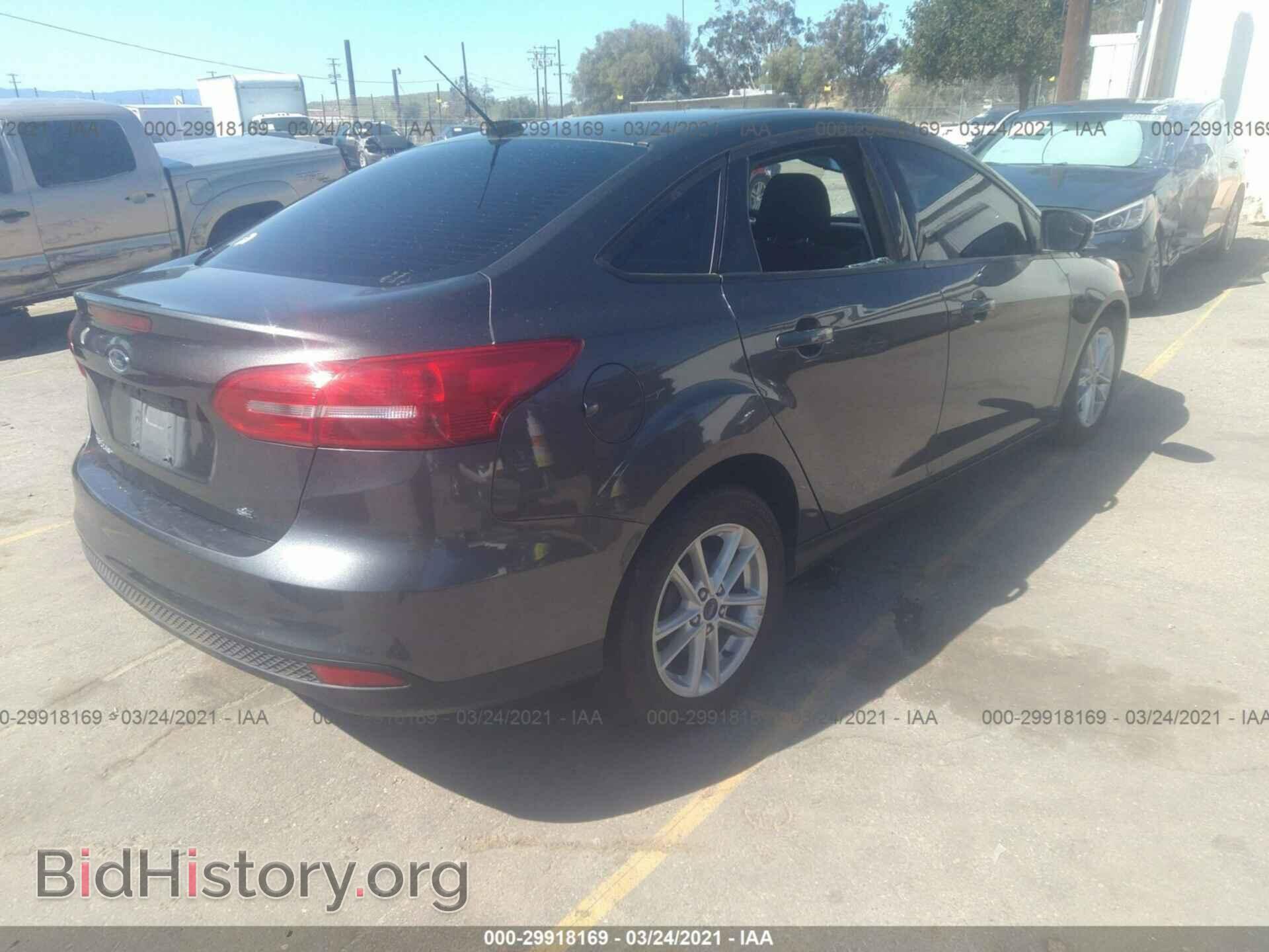 2016 FORD FOCUS - VIN: 1FADP3F2XGL306399 - Фото 4