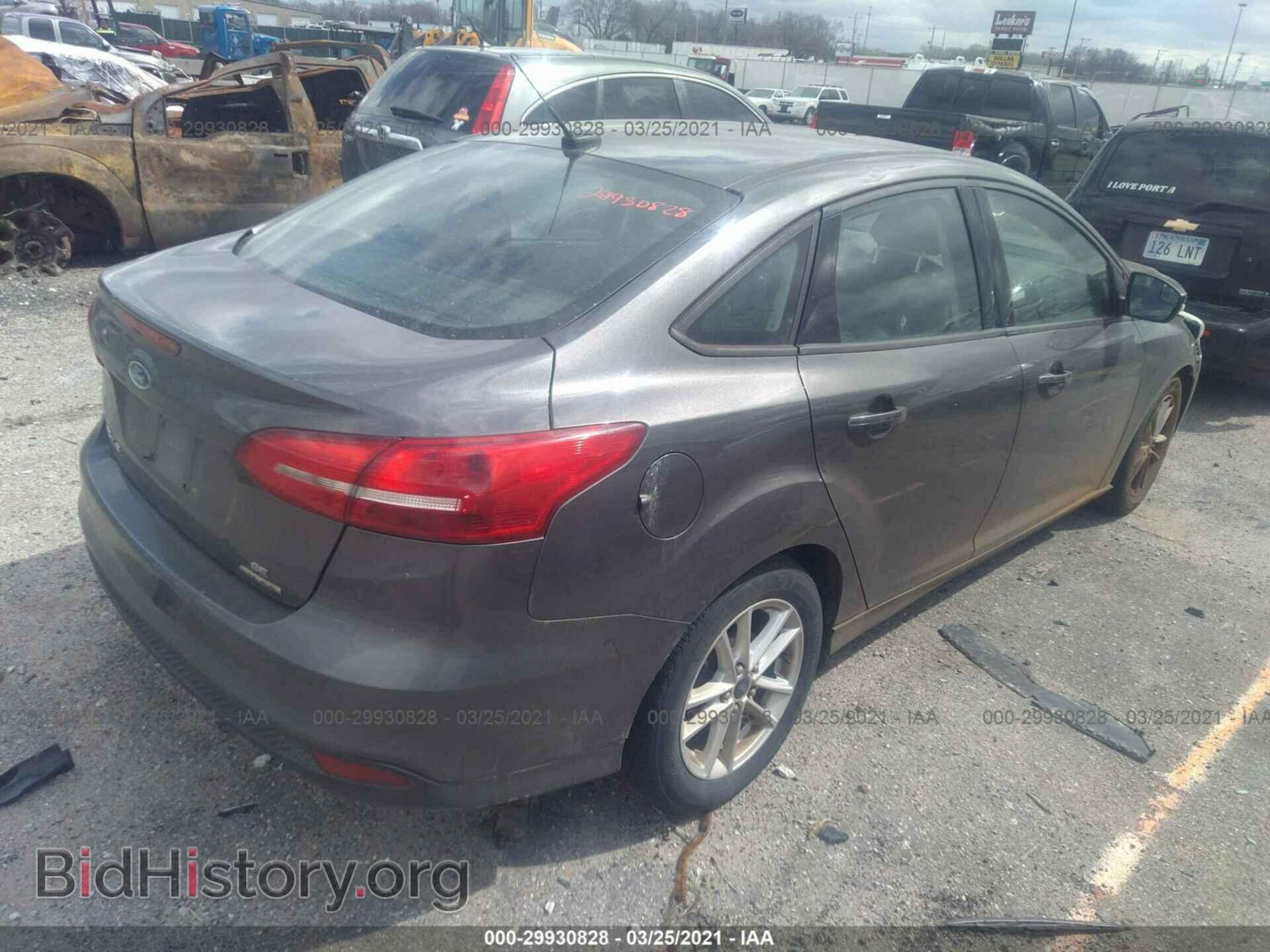 2015 FORD FOCUS - VIN: 1FADP3F20FL204348 - Photo 4