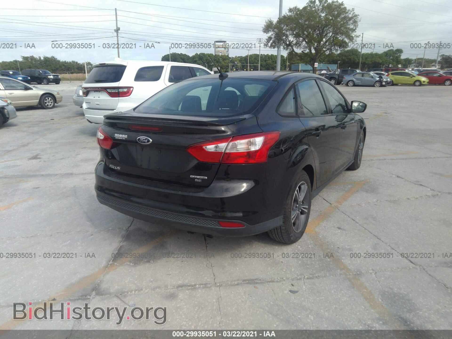 2014 FORD FOCUS - VIN: 1FADP3F21EL291983 - Photo 4