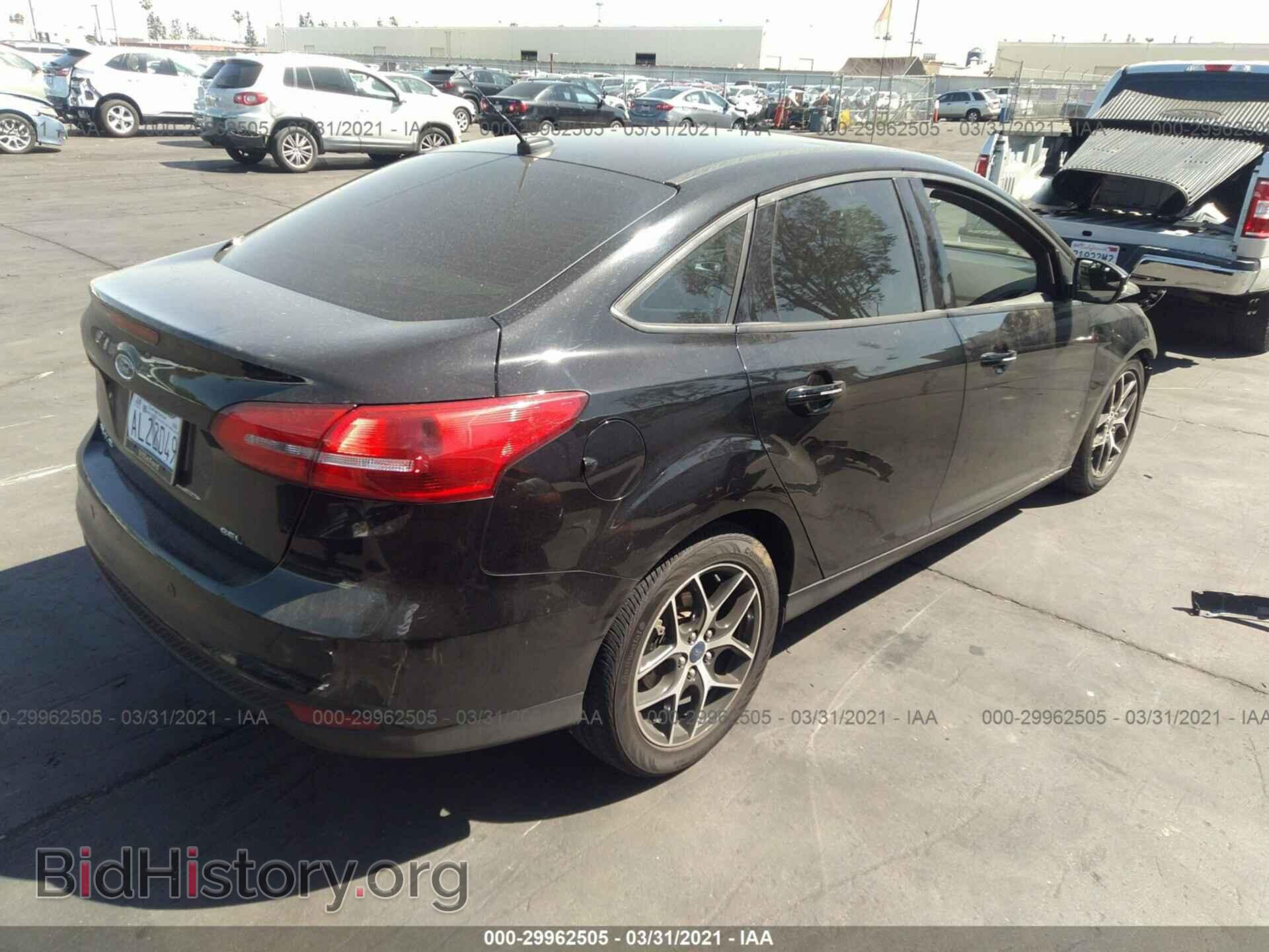 2017 FORD FOCUS - VIN: 1FADP3H27HL213936 - Photo 4