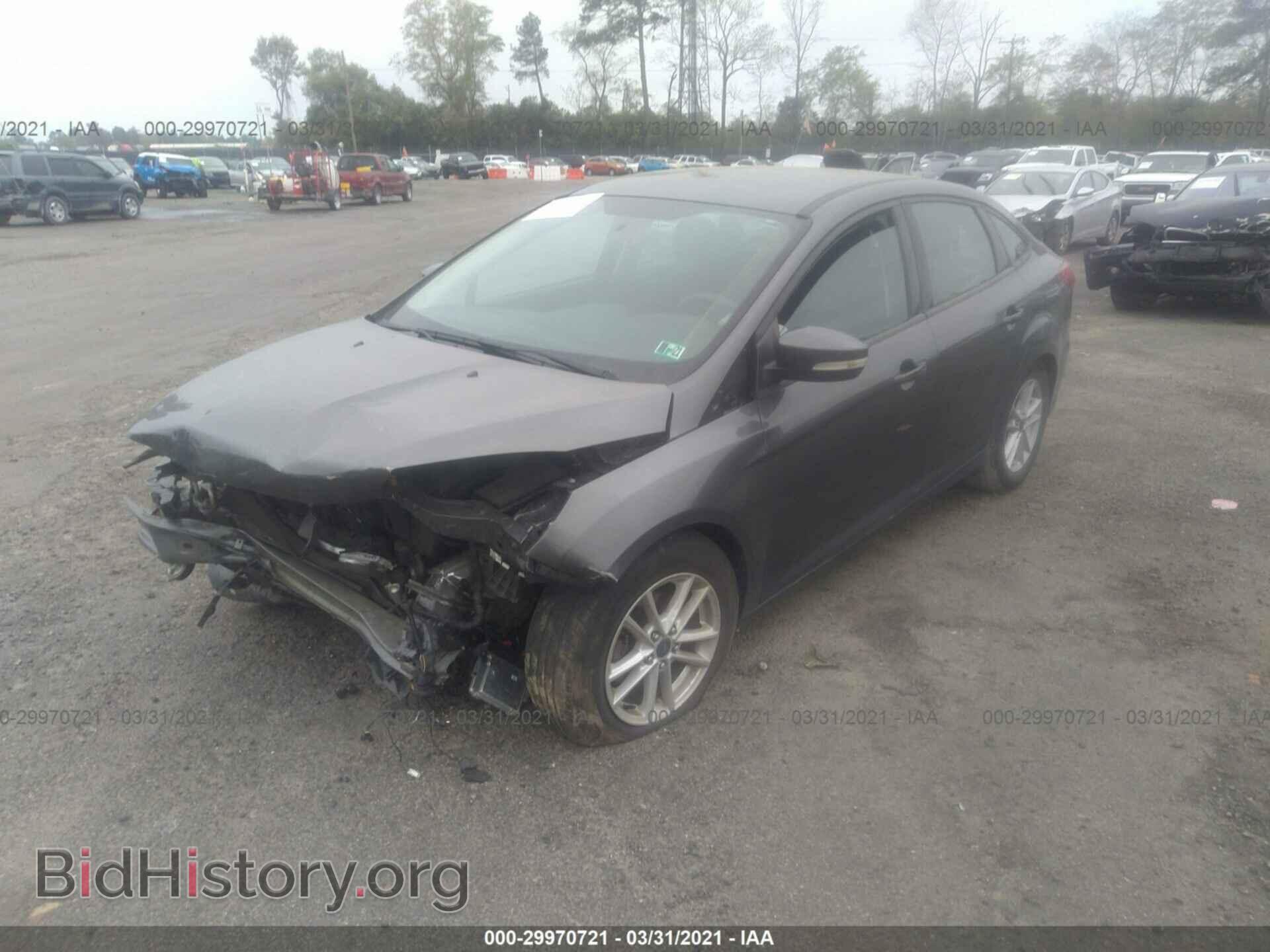 2016 FORD FOCUS - VIN: 1FADP3F22GL309555 - Фото 2