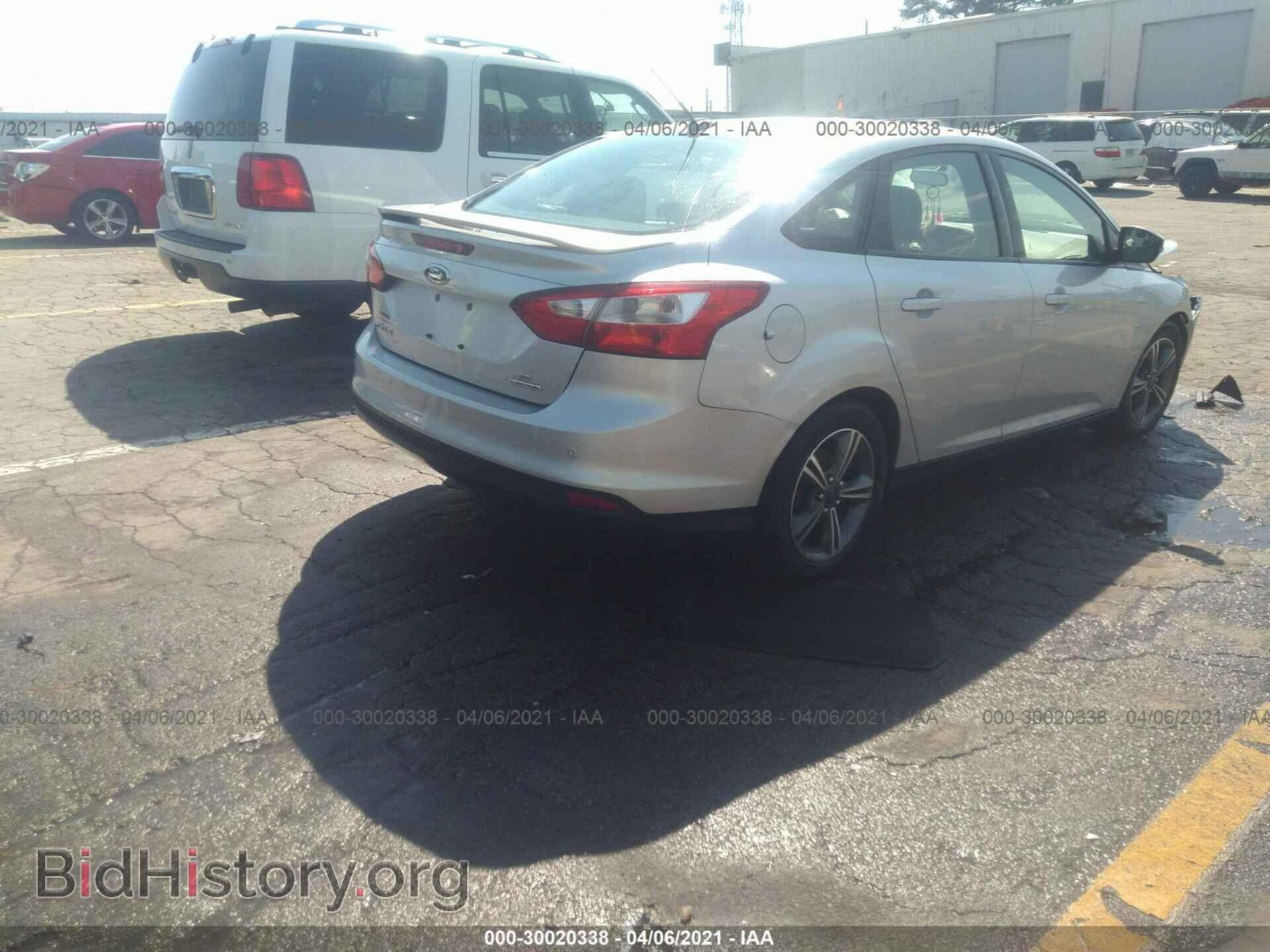 2014 FORD FOCUS - VIN: 1FADP3F2XEL402823 - Photo 4