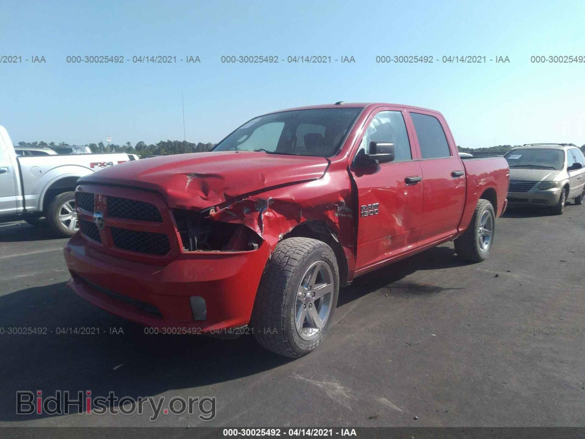 2014 RAM 1500 - VIN: 3C6RR7KT1EG248328 - Фото 2