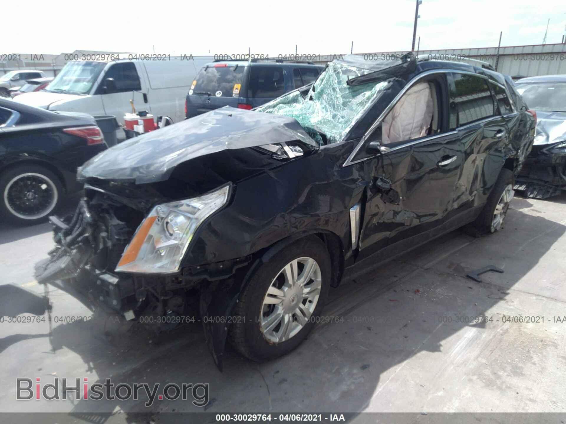 2013 CADILLAC SRX - VIN: 3GYFNCE36DS650766 - Фото 2