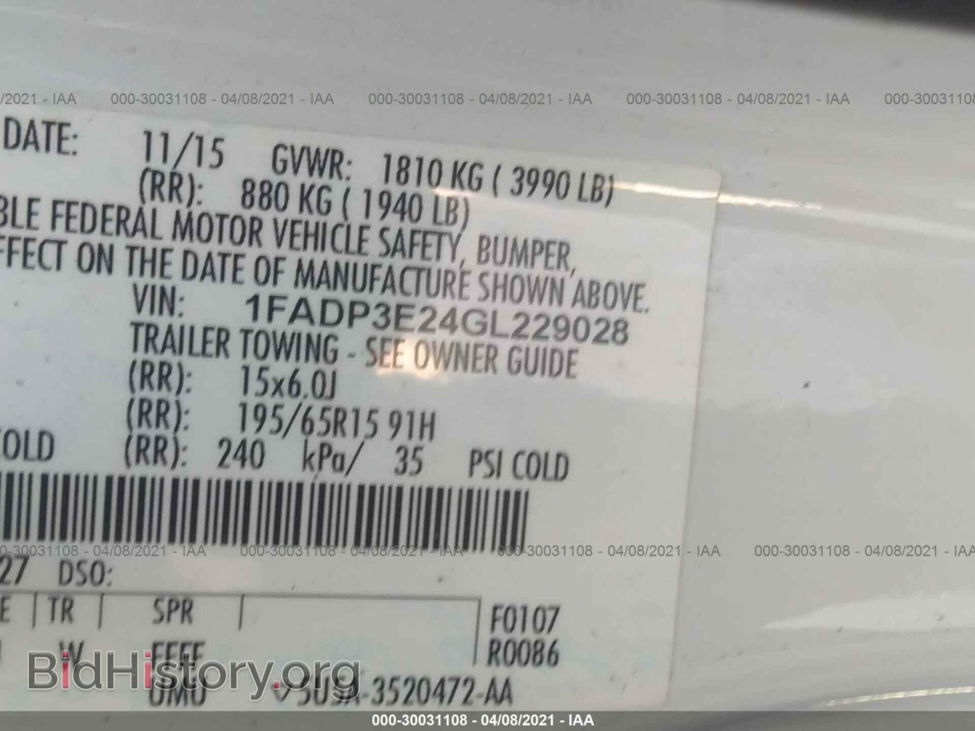 2016 FORD FOCUS - VIN: 1FADP3E24GL229028 - Фото 9