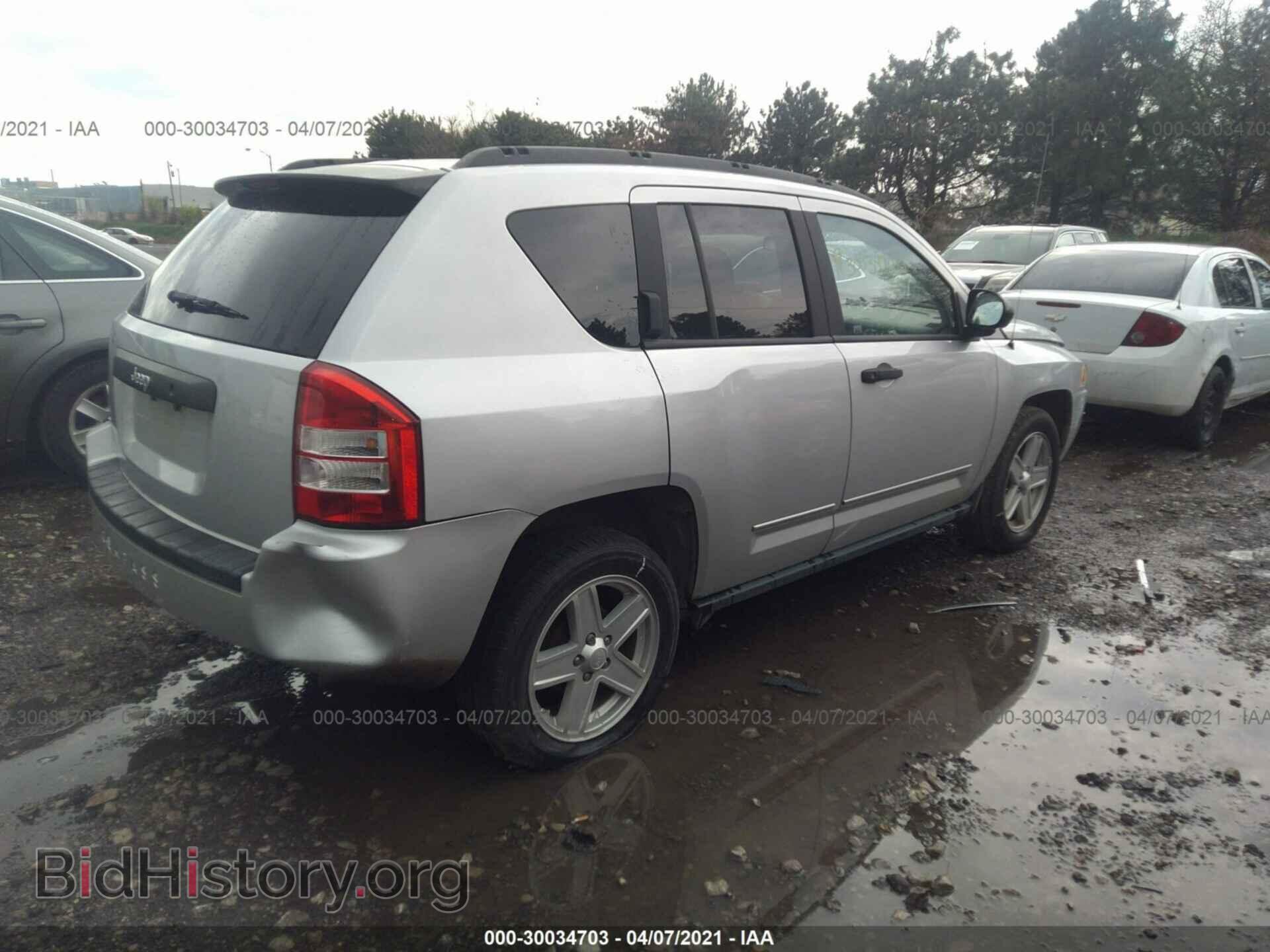 2010 JEEP COMPASS - VIN: 1J4NT1FB0AD671104 - Фото 4