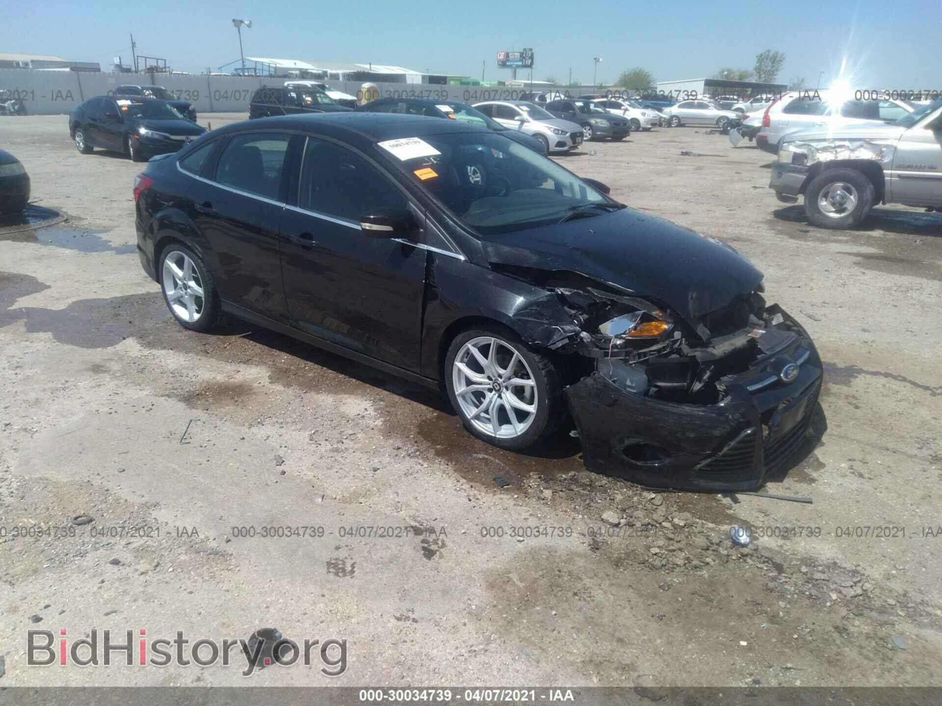 Фотография 1FADP3J21EL321121 - FORD FOCUS 2014