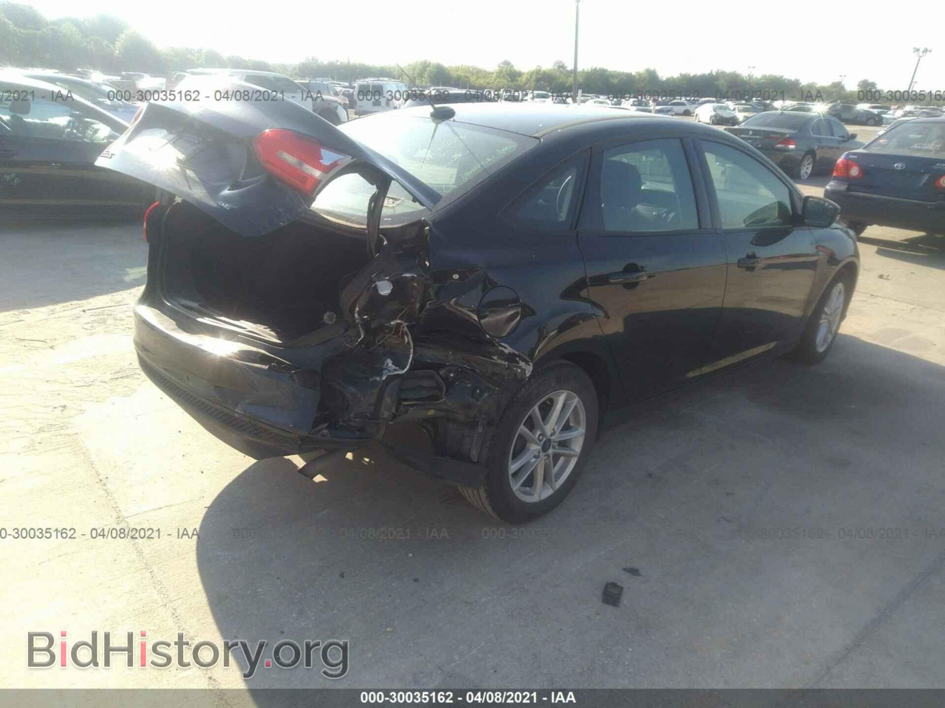 2017 FORD FOCUS - VIN: 1FADP3F25HL322995 - Фото 4