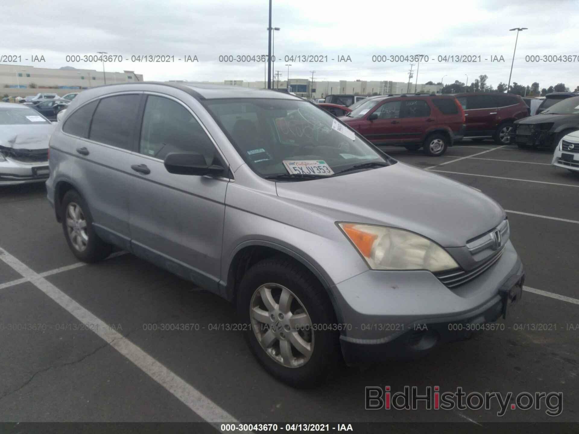 Photo JHLRE38597C023458 - HONDA CR-V 2007