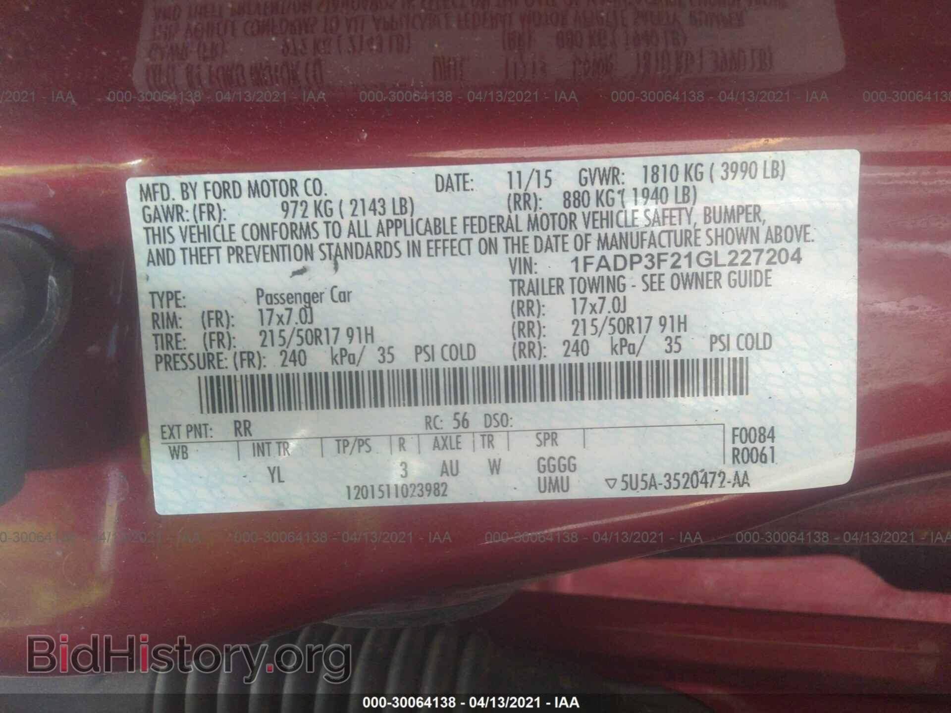 2016 FORD FOCUS - VIN: 1FADP3F21GL227204 - Фото 9