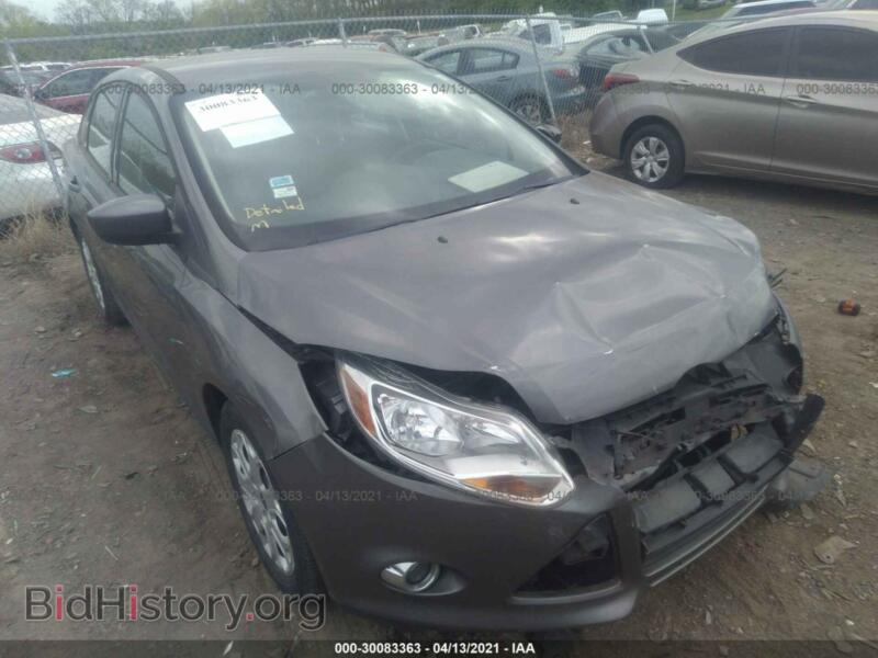 2012 Ford FOCUS SE (VIN 1FAHP3F28CL263404) — фото 1 из 12, IAAI, повреждение: передняя и задняя часть