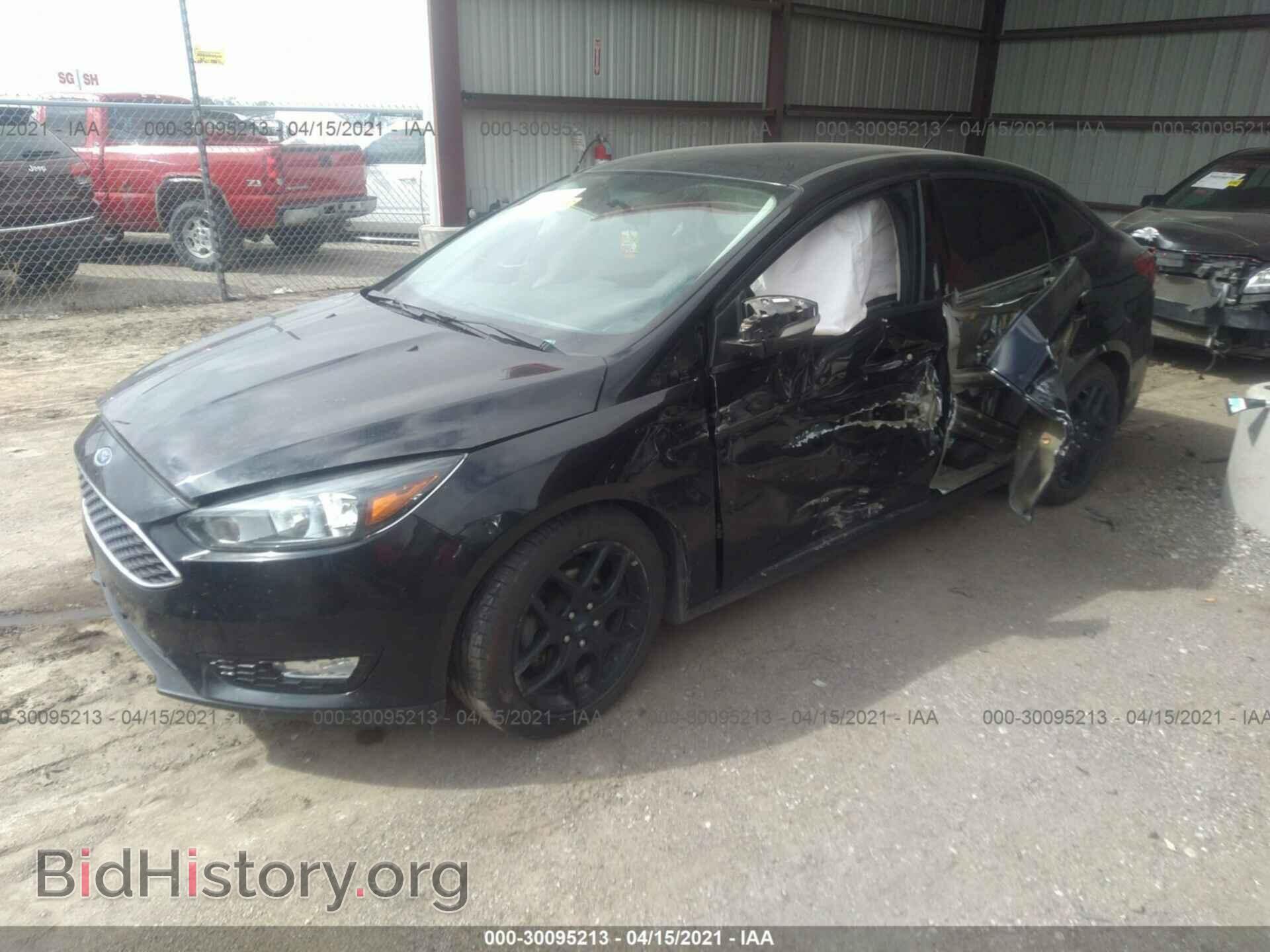 2016 FORD FOCUS - VIN: 1FADP3F22GL330230 - Фото 2
