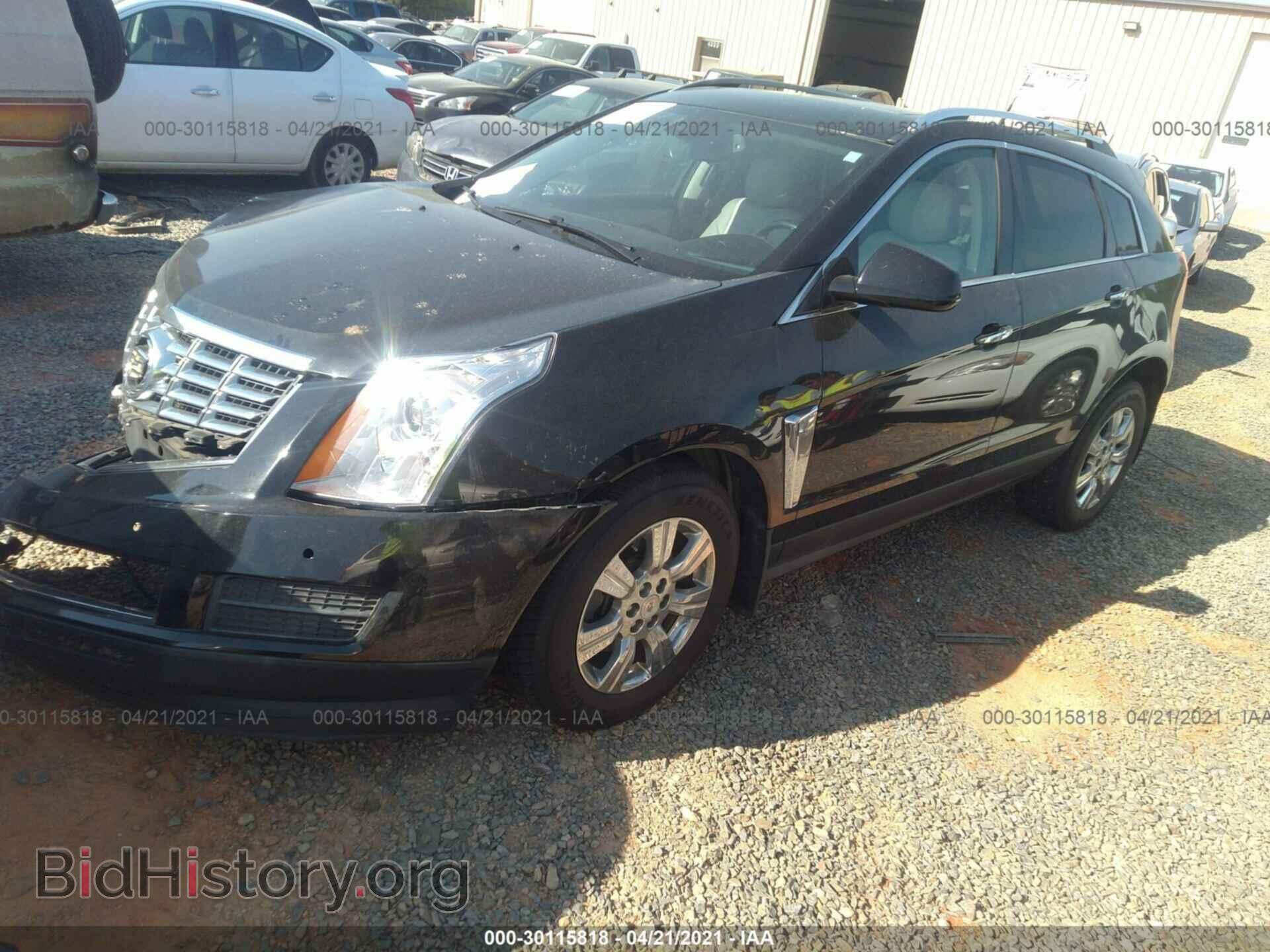 2014 CADILLAC SRX - VIN: 3GYFNBE34ES566277 - Фото 2