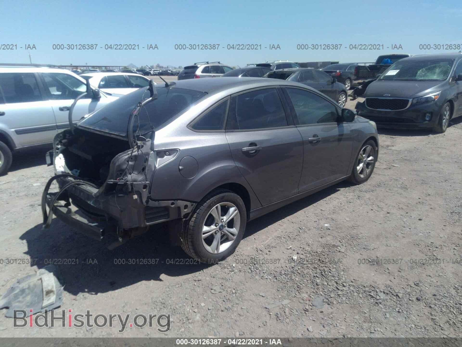 2013 FORD FOCUS - VIN: 1FADP3F28DL107945 - Photo 4