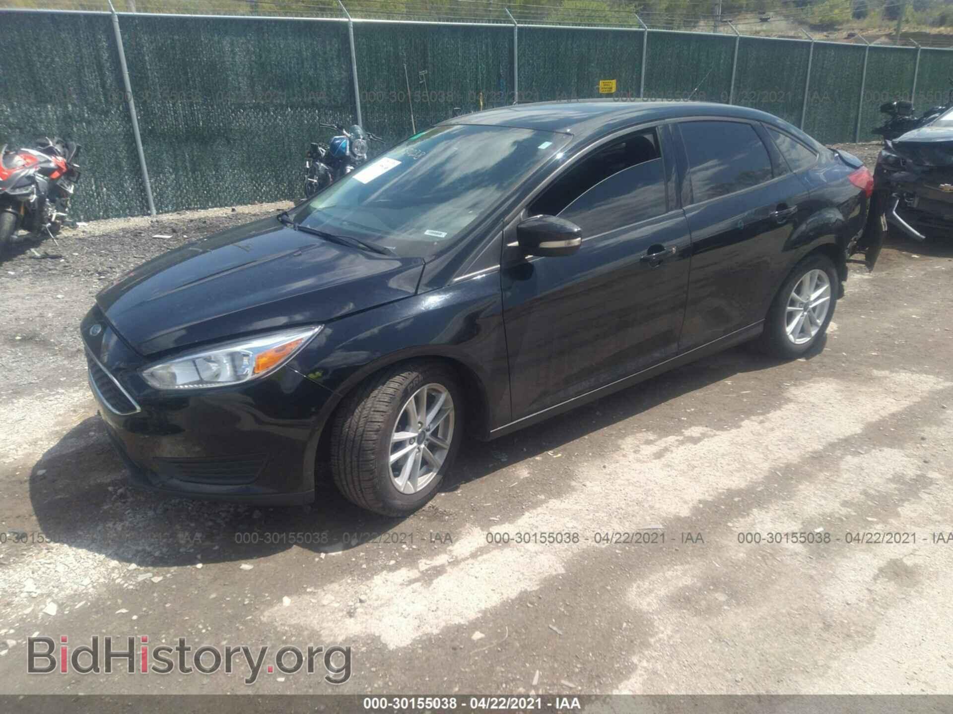 2016 FORD FOCUS - VIN: 1FADP3F22GL201923 - Photo 2