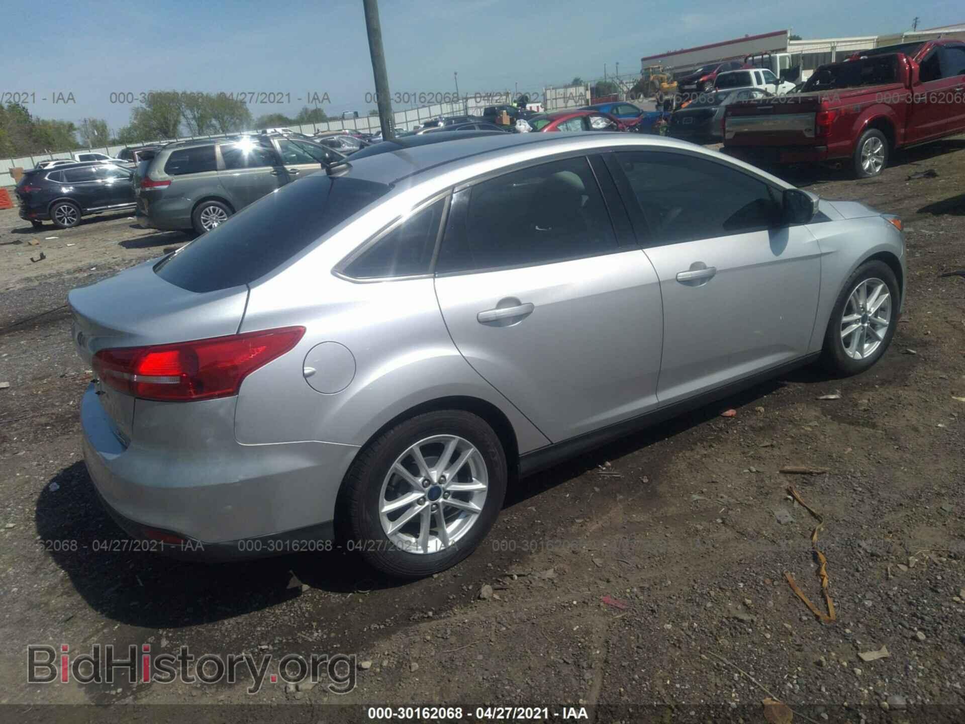 2016 FORD FOCUS - VIN: 1FADP3F21GL376051 - Photo 4