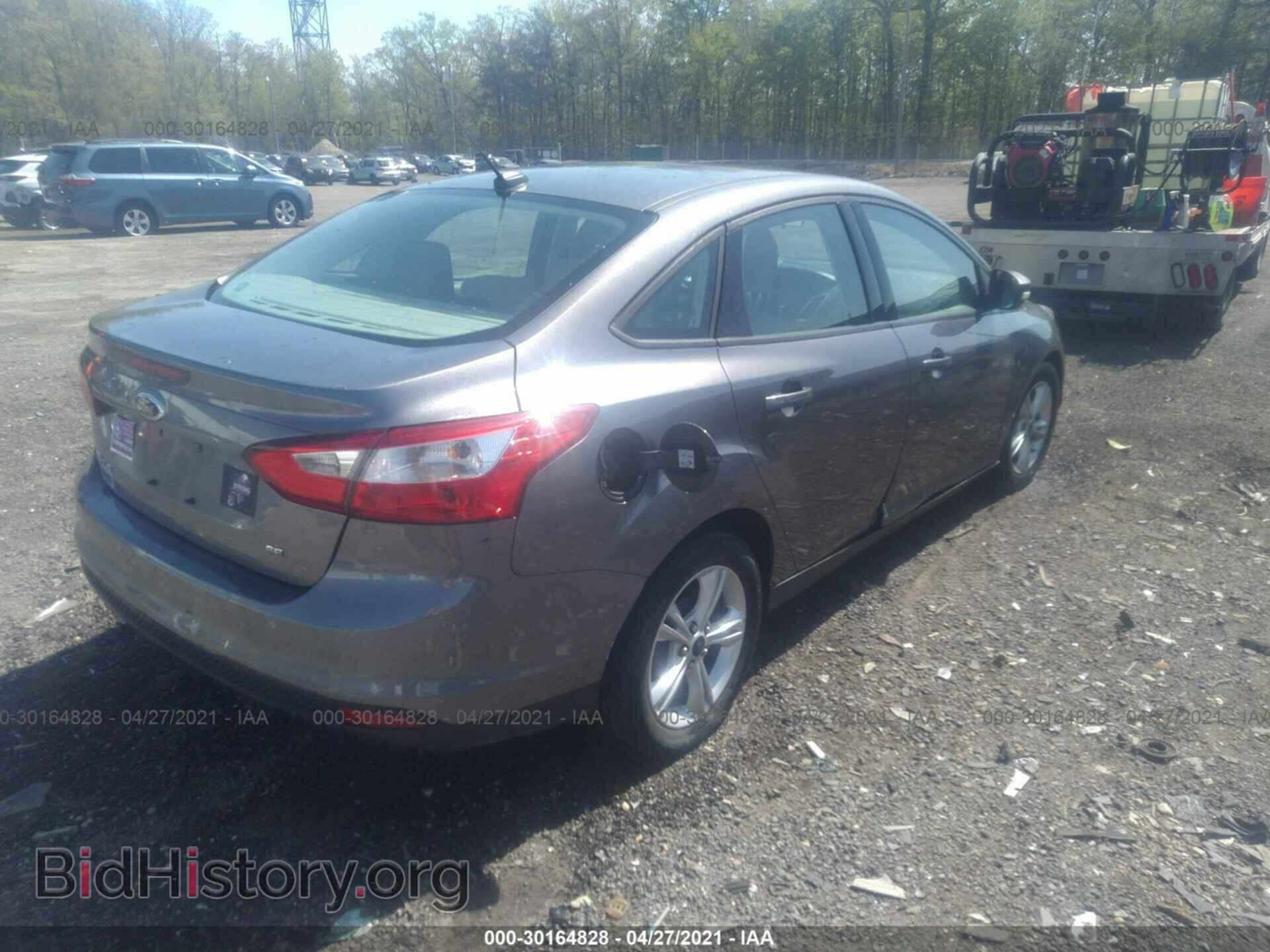 2014 FORD FOCUS - VIN: 1FADP3F25EL435423 - Photo 4