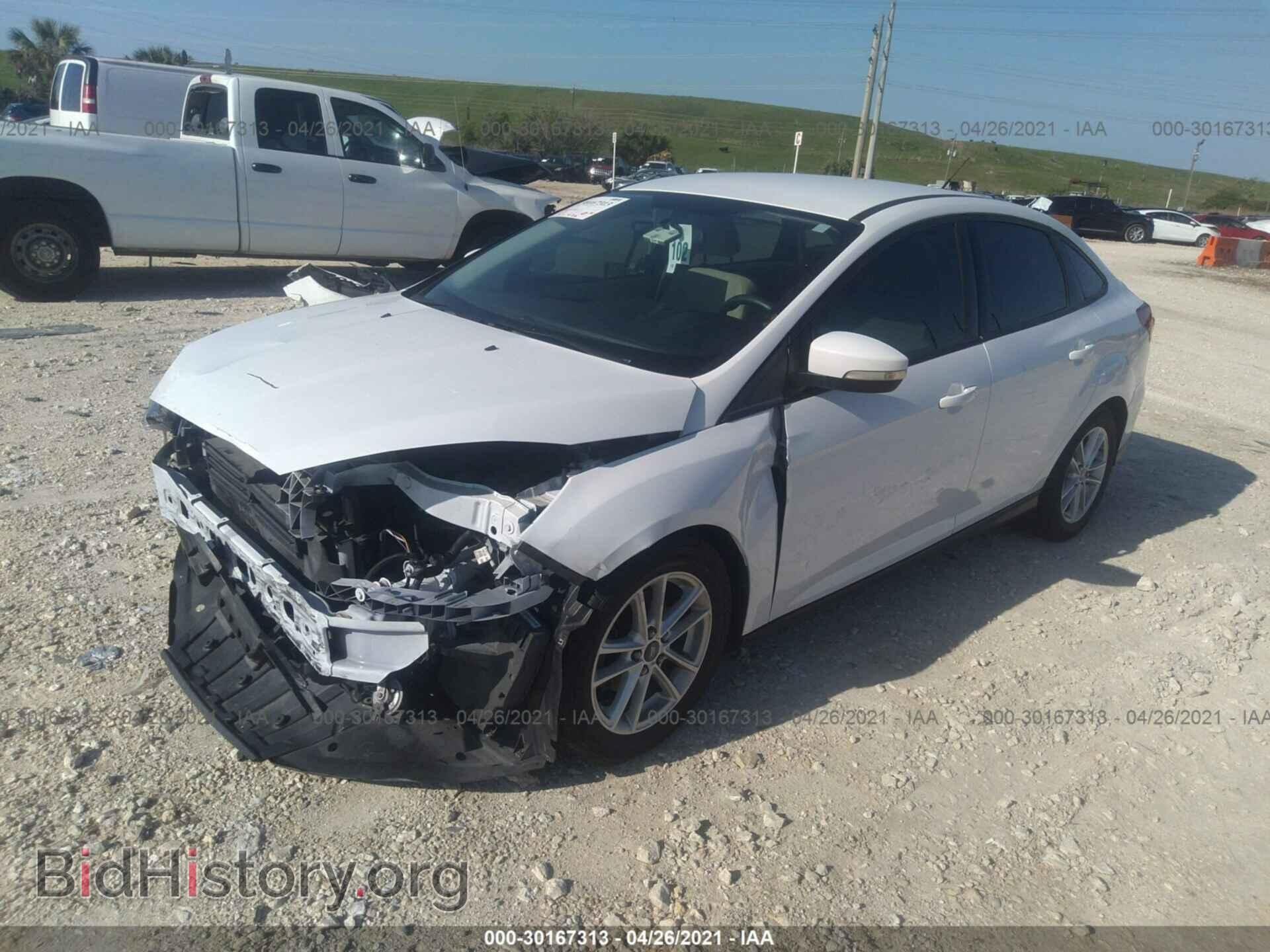 2016 FORD FOCUS - VIN: 1FADP3F21GL235660 - Фото 2